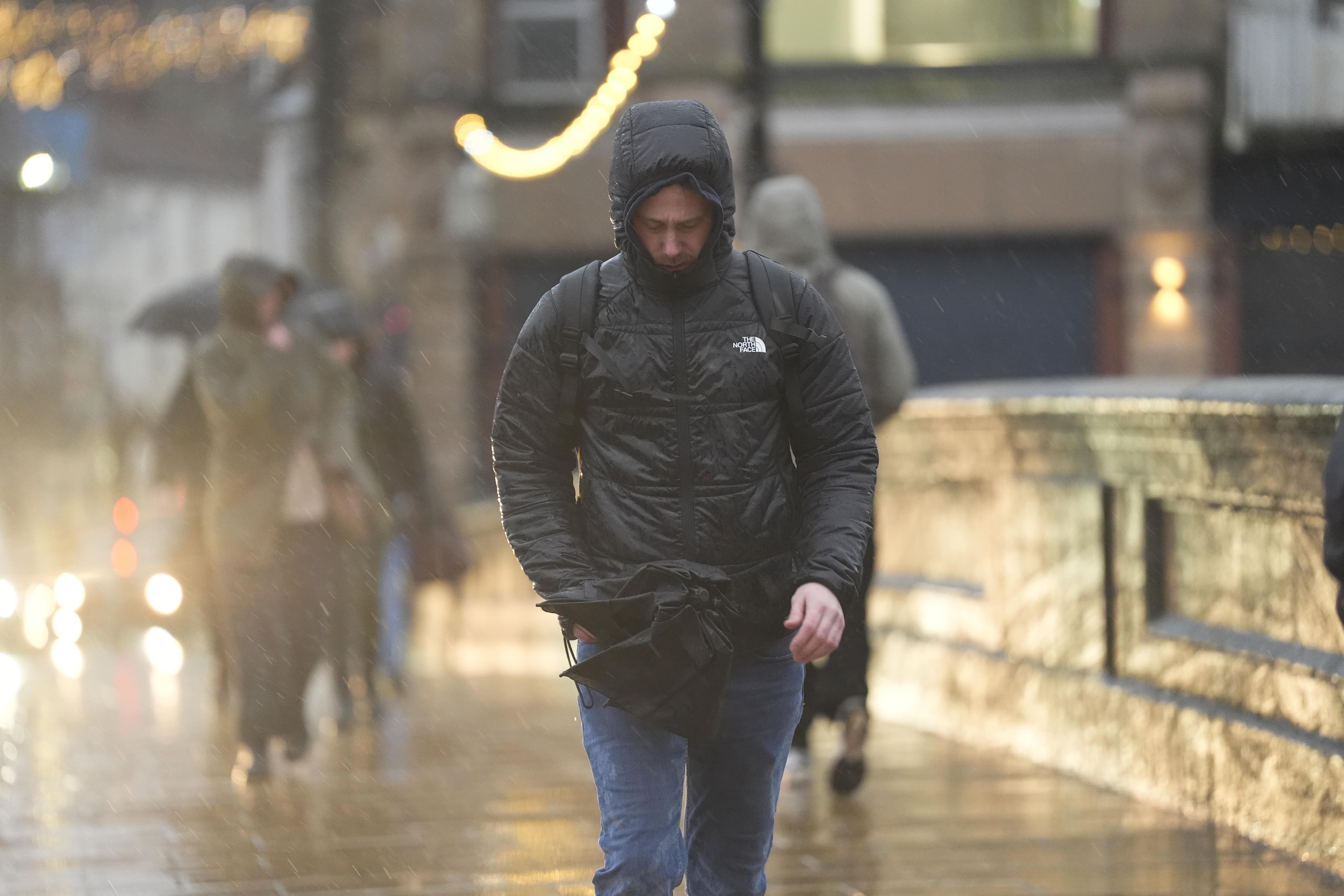People walking in York during Storm Chandra