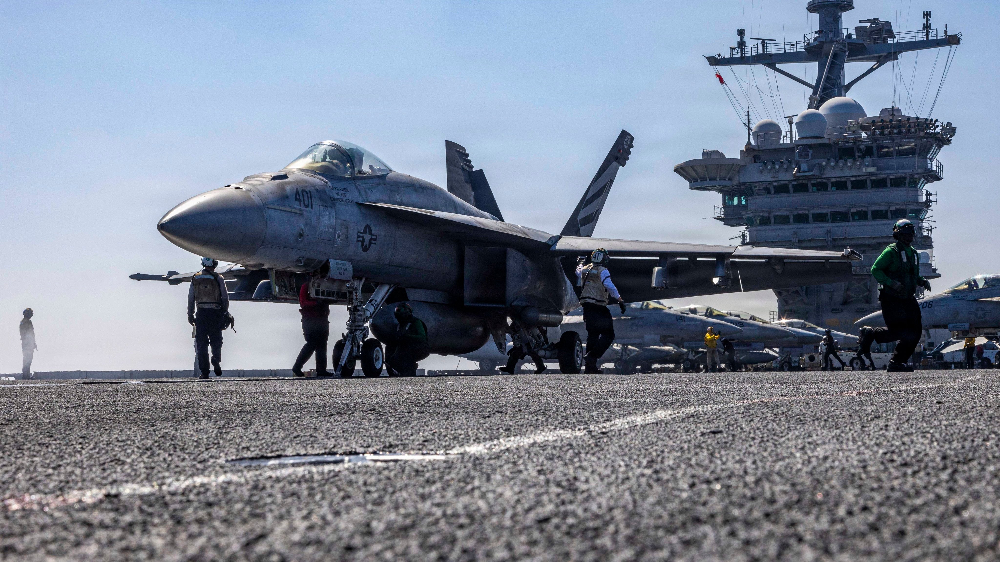 A squadron conducts flight operations aboard USS Abraham Lincoln in the Arabian Sea this week