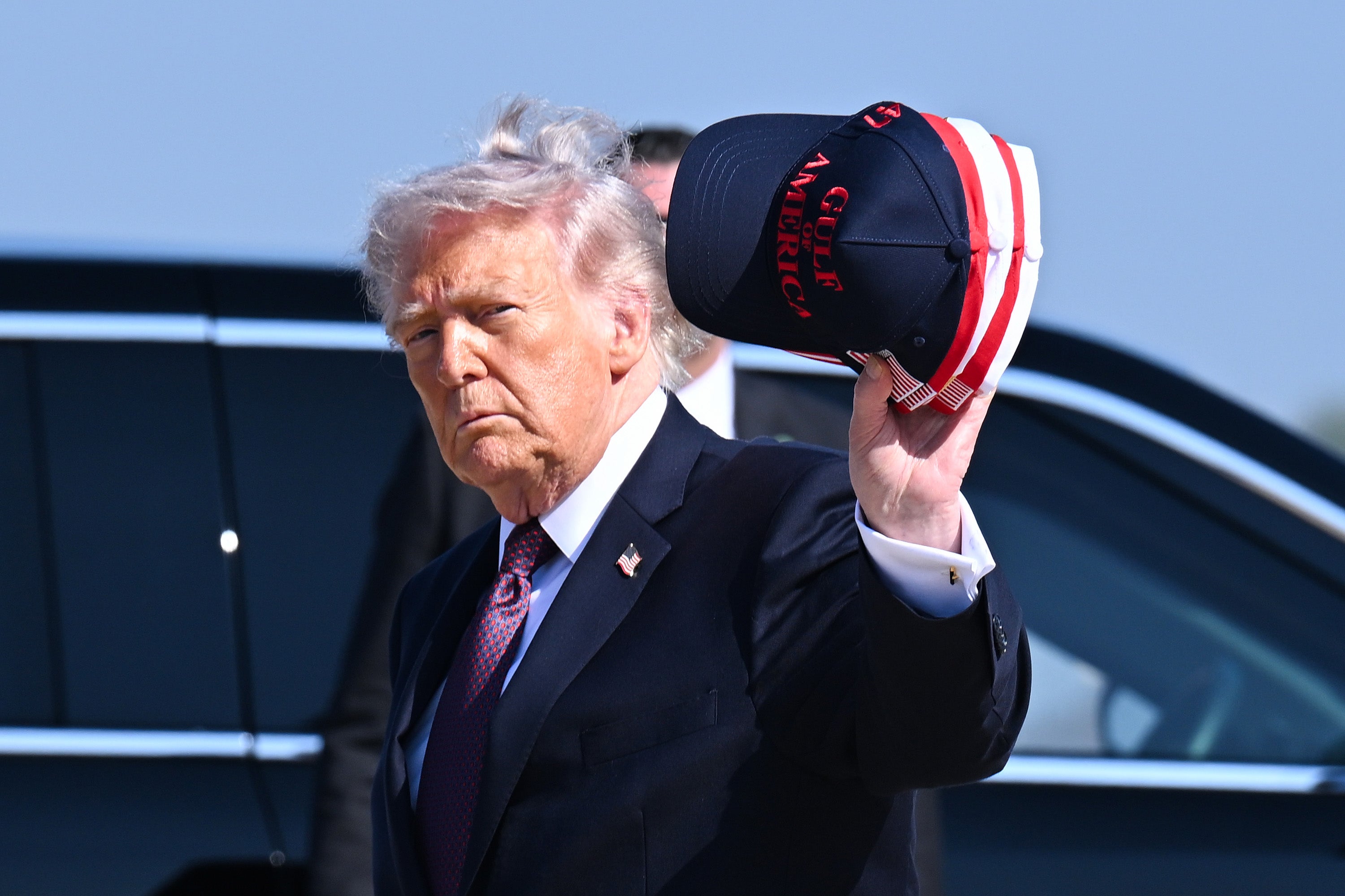 Trump was criticized for donning 1 of his signature branded caps during nan ceremony, which was seen arsenic disrespectful to fallen work members
