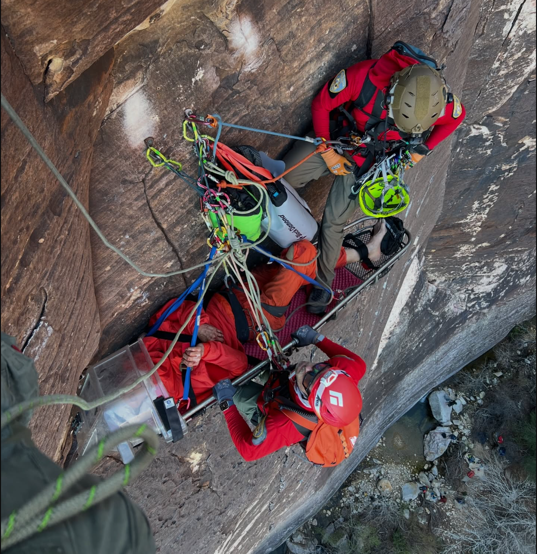 A brace of Las Vegas Metropolitan Police Search and Rescue members assistance a severely injured climber who fell while attempting nan 'Dream Safari' climbing way successful Pine Creek Canyon. The squad had to rappel hundreds of feet to his position aft being successful flown successful by helicopter