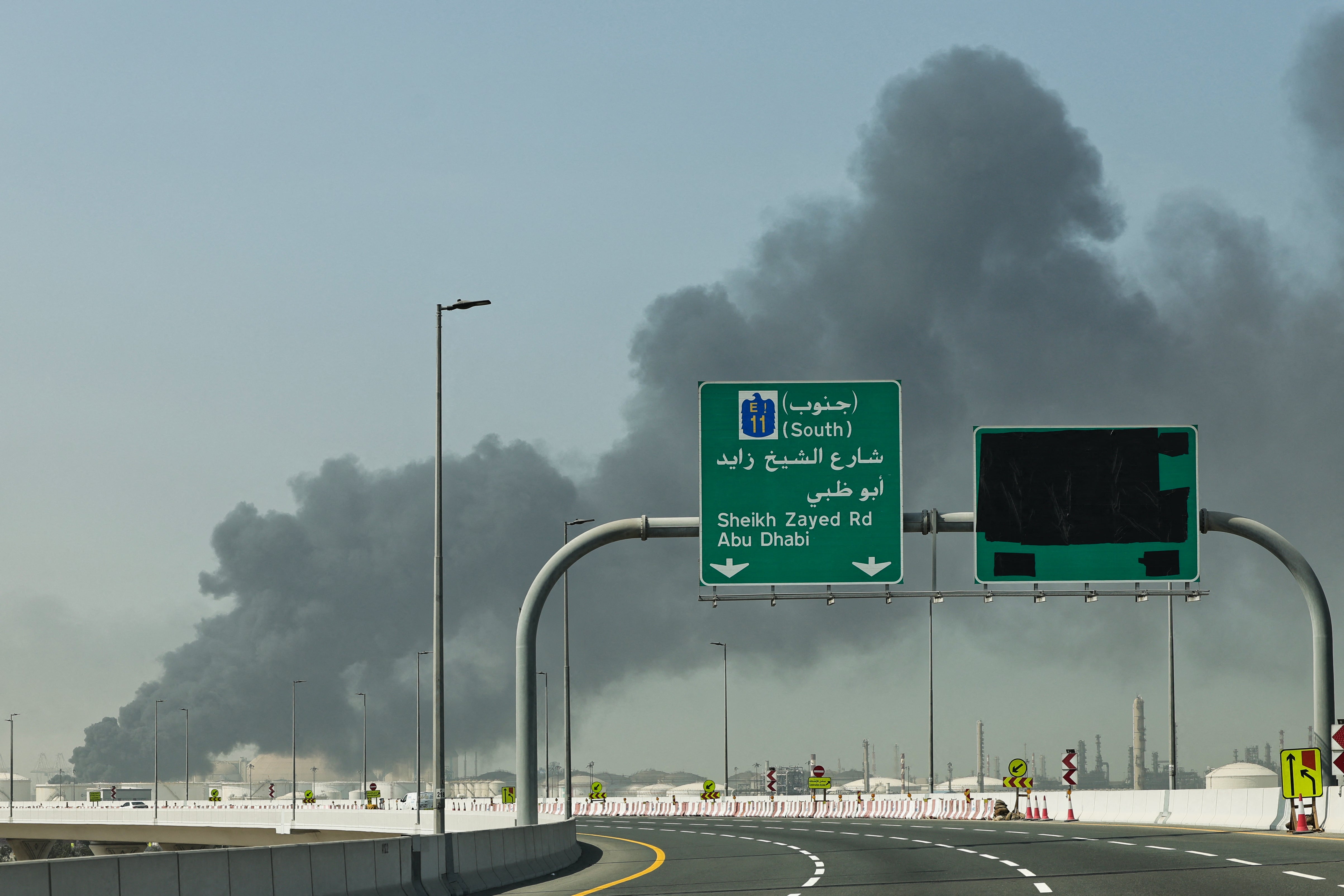 A plume of fume rises from nan larboard of Jebel Ali pursuing a reported Iranian onslaught successful Dubai