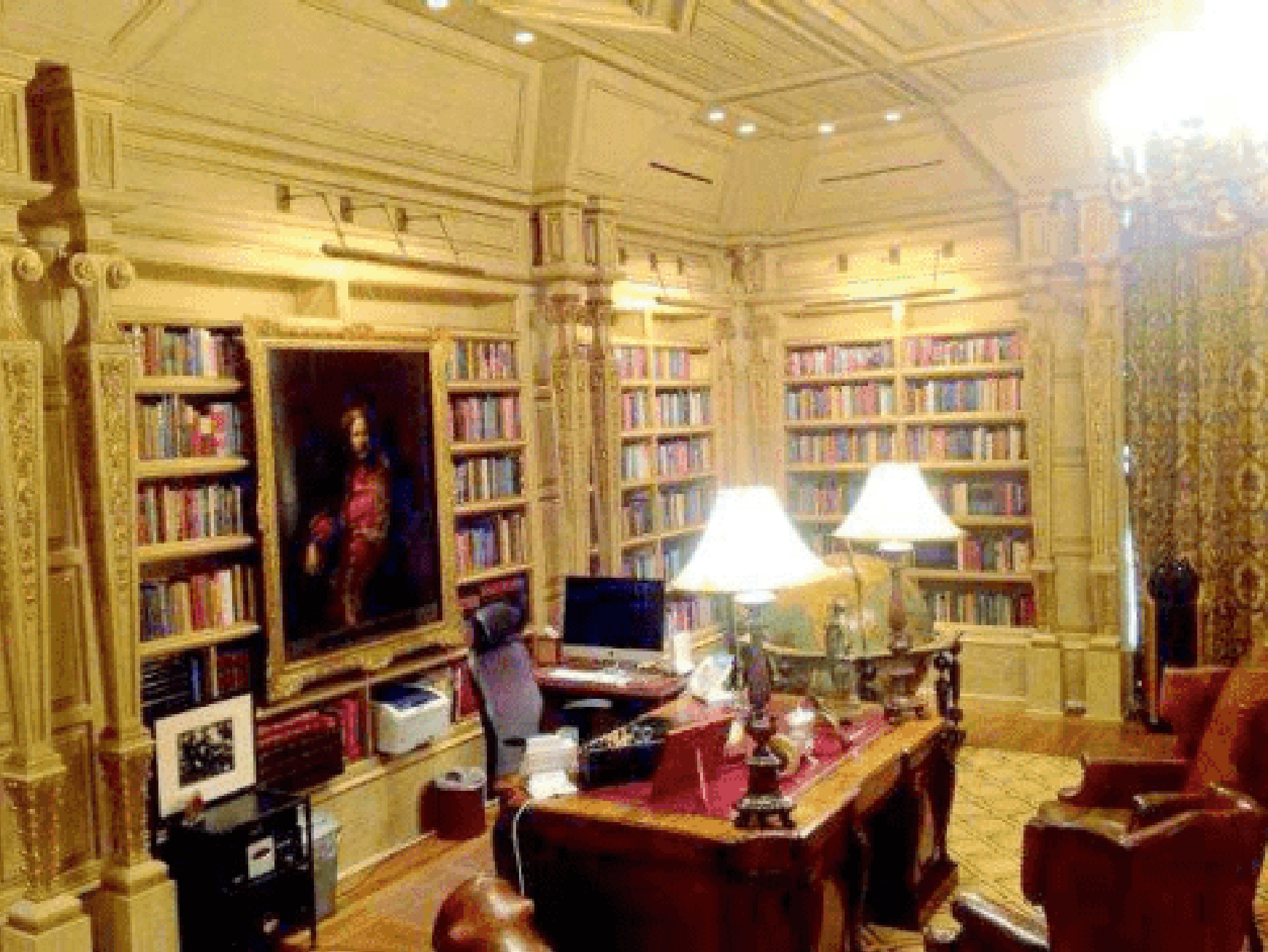 The office, pictured pinch bookshelves lining nan walls and a ample woody table successful nan mediate of nan room