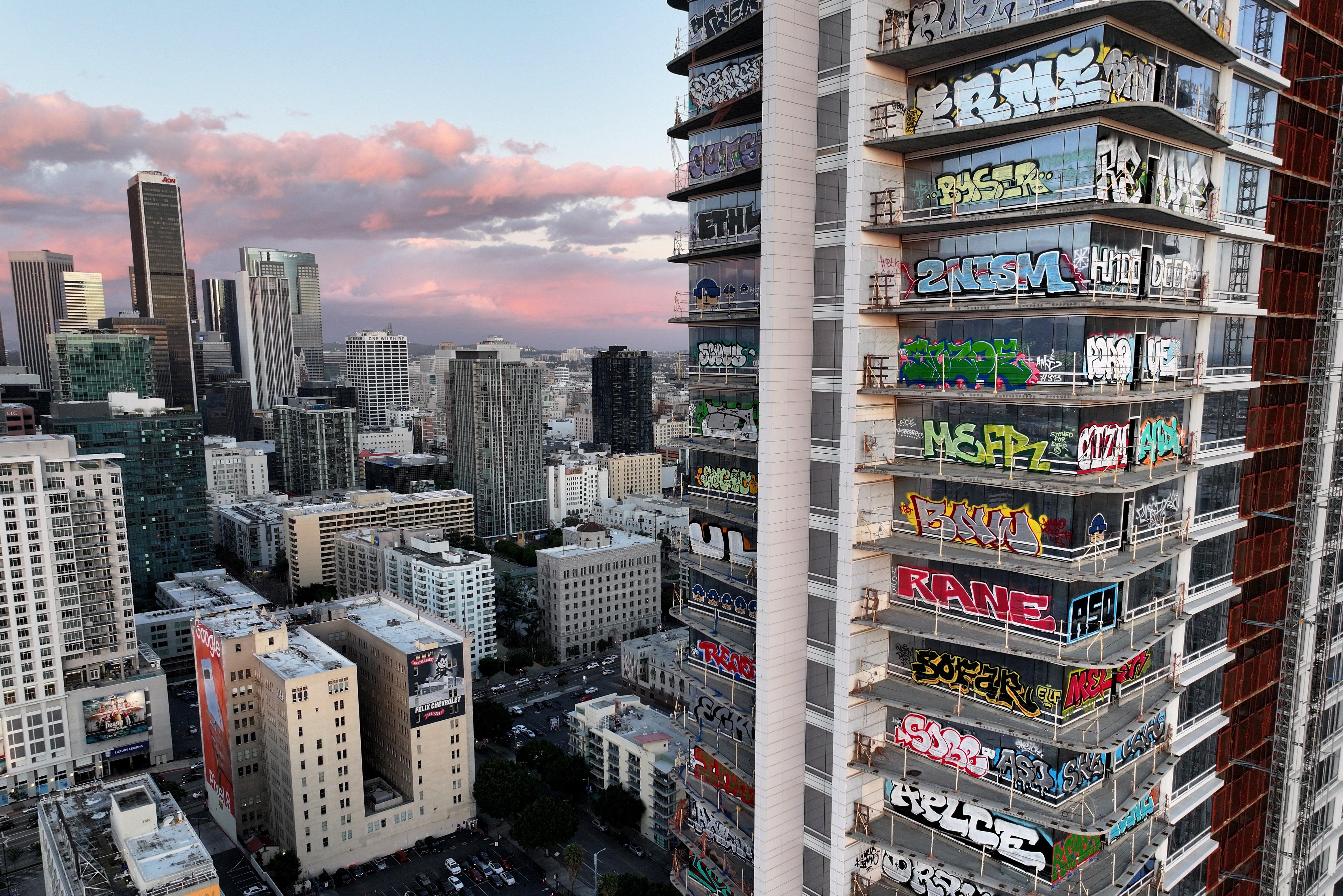 Three infamous graffiti-covered skyscrapers successful downtown Los Angeles person been purchased arsenic portion of a renewal task that is expected to costs complete $1.2 billion