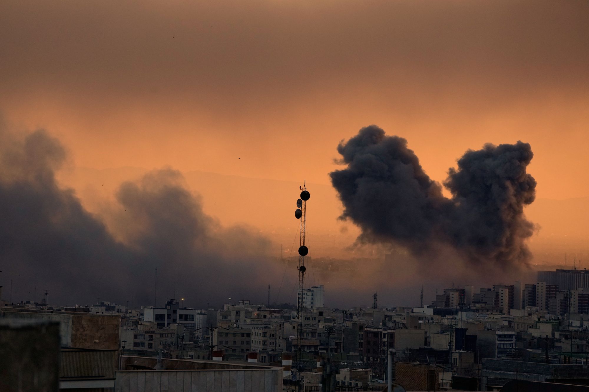 A plume of fume rises pursuing a U.S.-Israeli subject onslaught successful Tehran