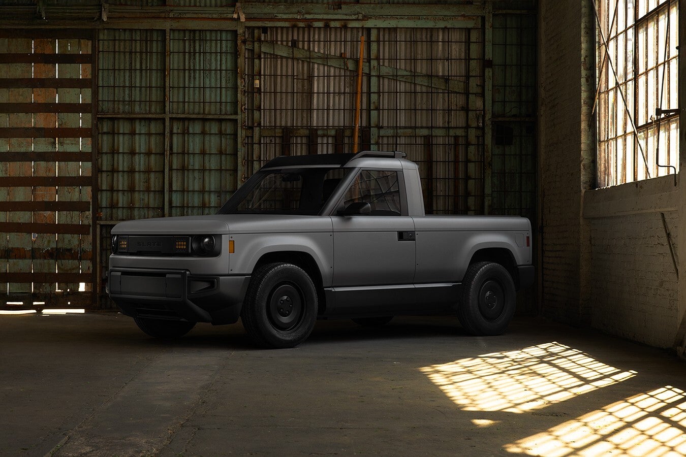 This photo provided by Slate shows the Slate Truck, a barebones two-passenger electric pickup truck that the owner can extensively customize after it rolls off the production line. (Courtesy of Slate Auto via AP)