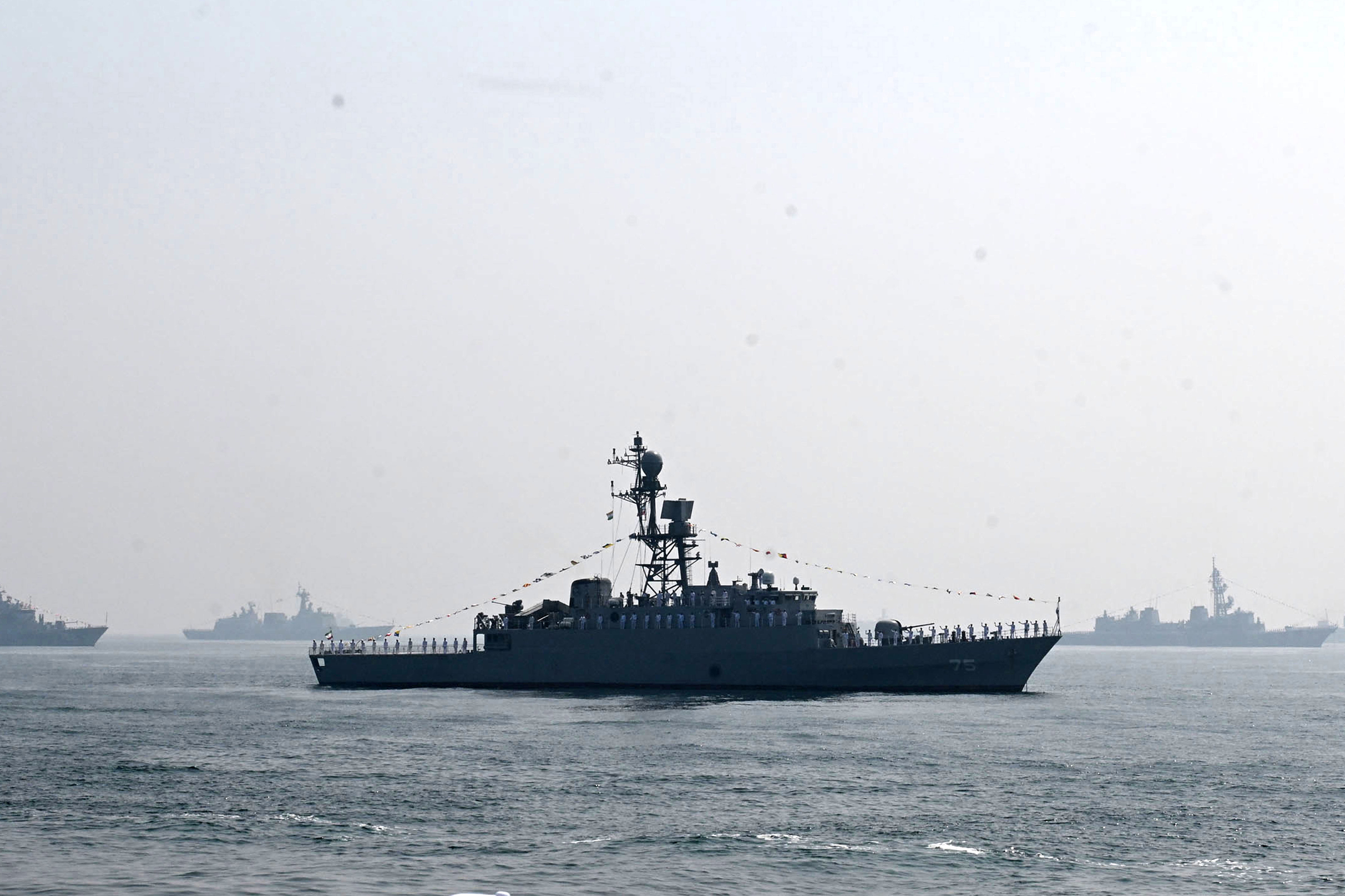 Iranian warship IRIS Dena is seen successful nan Bay of Bengal during nan International Fleet Review successful 2026