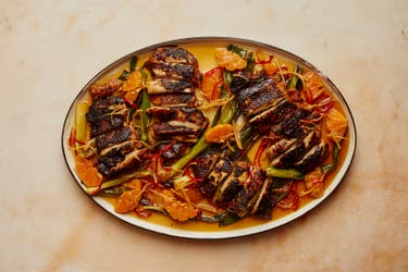 <p>Chicken cooked with bright spices, citrus and herbs – a simple sign that spring cooking has arrived</p>