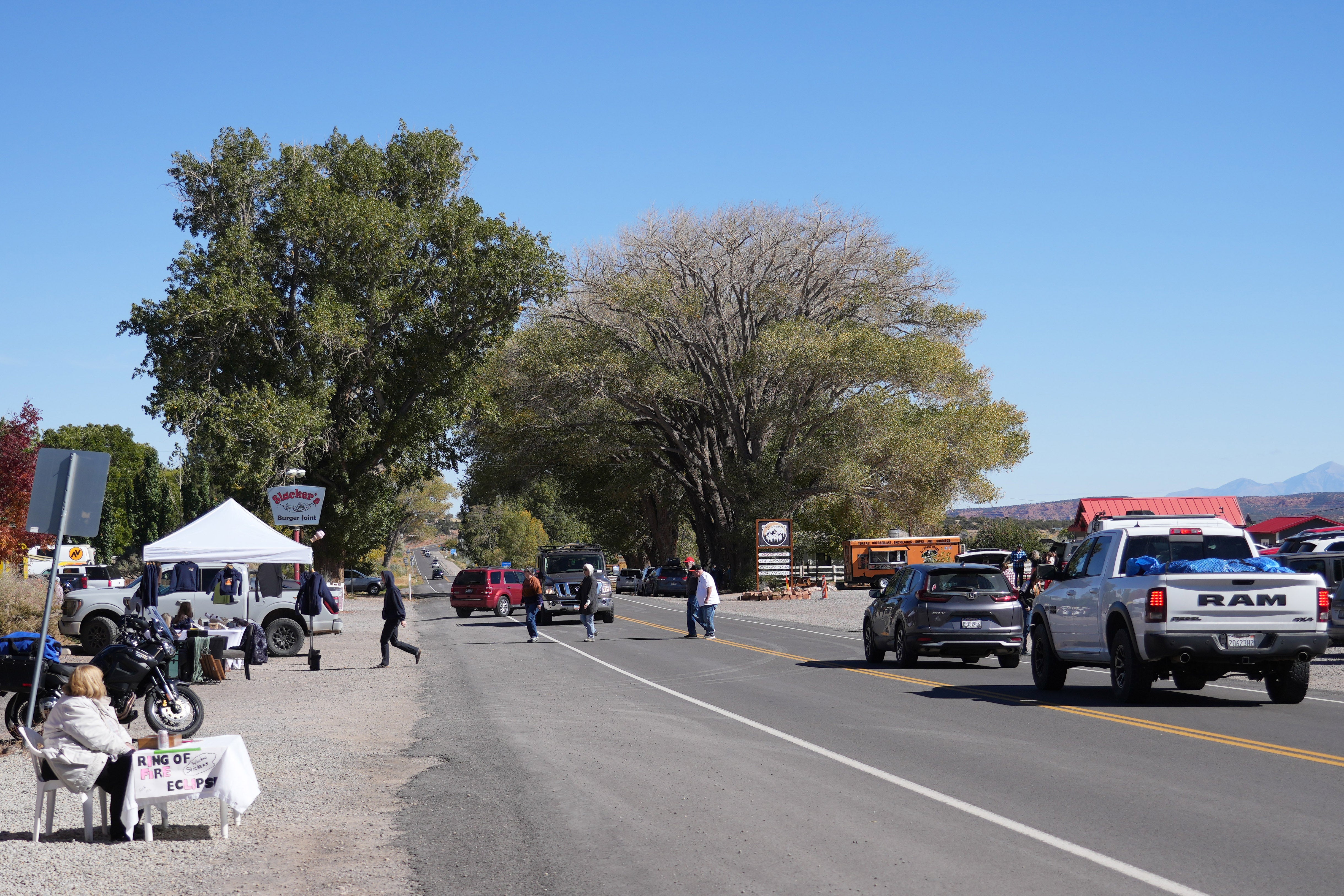 The bodies of the three women, discovered Wednesday in Wayne County, triggered a multi-agency homicide investigation spanning the small tourist gateway community of Torrey (pictured) and surrounding areas