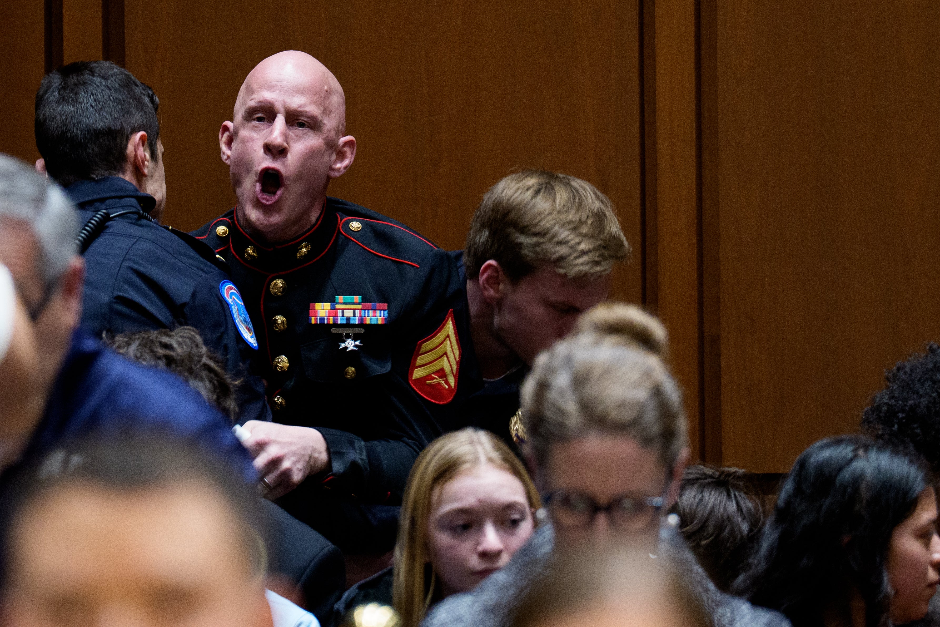 Marine Corps seasoned Brian McGinnis, had his limb surgery by a sitting U.S. legislator while being ejected from a Senate Armed Services Subcommittee proceeding connected Wednesday. His mother says he began to mobility things aft deploying to Iraq during his work successful nan early 2000s