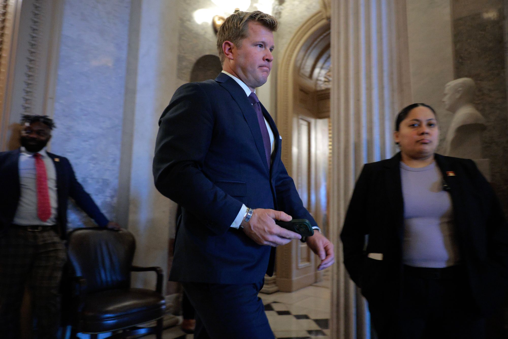 Sheehy, a Montana Republican and erstwhile Navy SEAL, leaves nan Senate enclosure aft he and members of nan Capitol Police forcibly removed Iraq War McGinnis