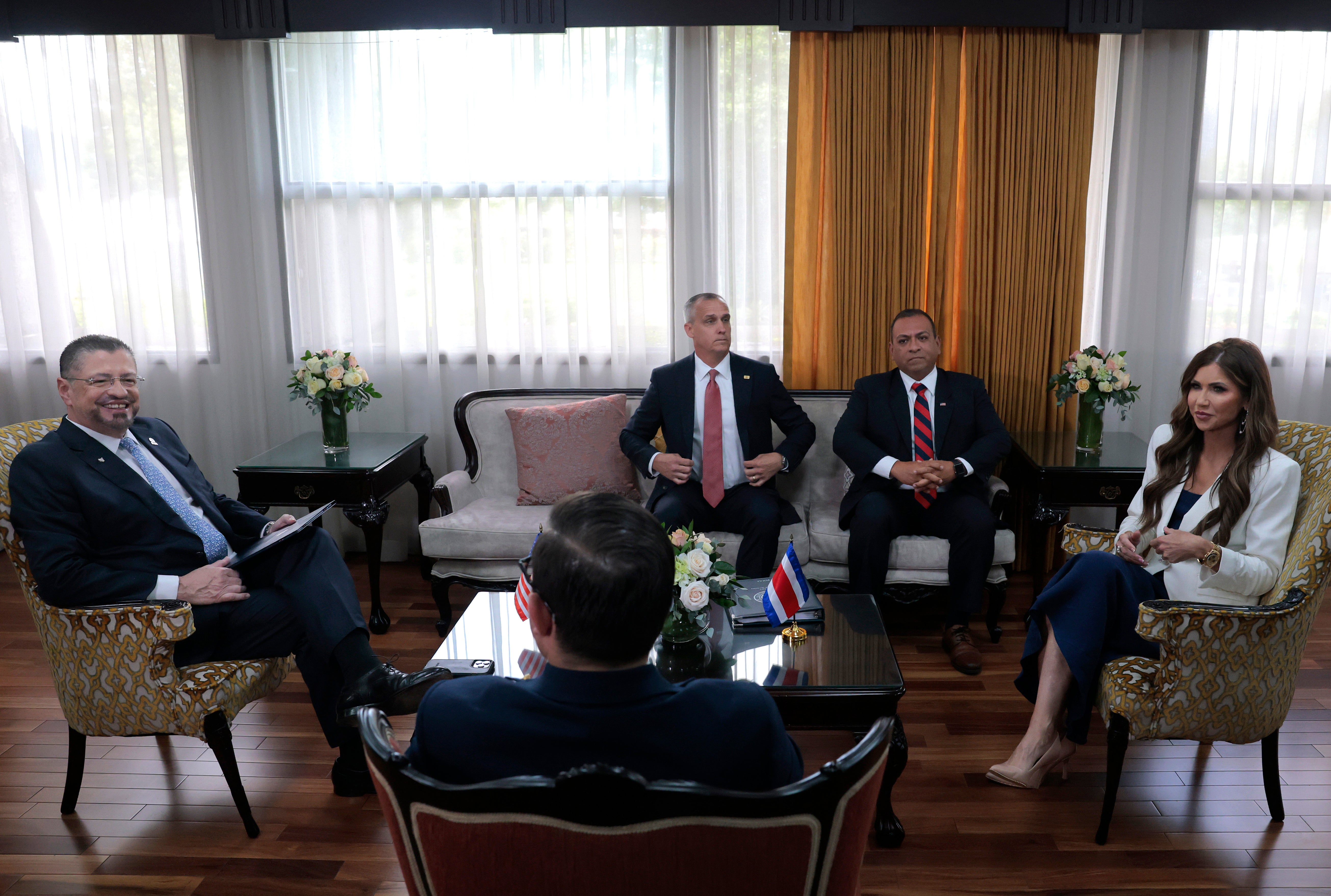 Noem was asked if she had a romanticist narration pinch DHS advisor Corey Lewandowski (center-left). She didn’t straight contradict nan matter erstwhile questioned by lawmakers