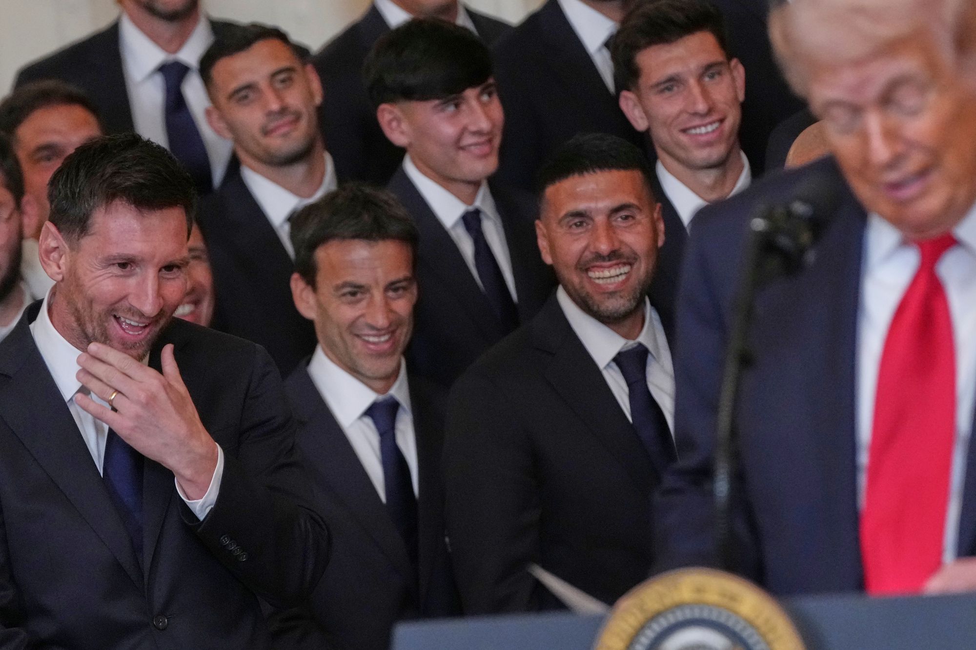 Donald Trump boasted of ‘totally demolishing’ Iranian subject forces arsenic world celebrated shot prima Lionel Messi and his Miami teammates stood awkwardly down him astatine a White House arena Thursday