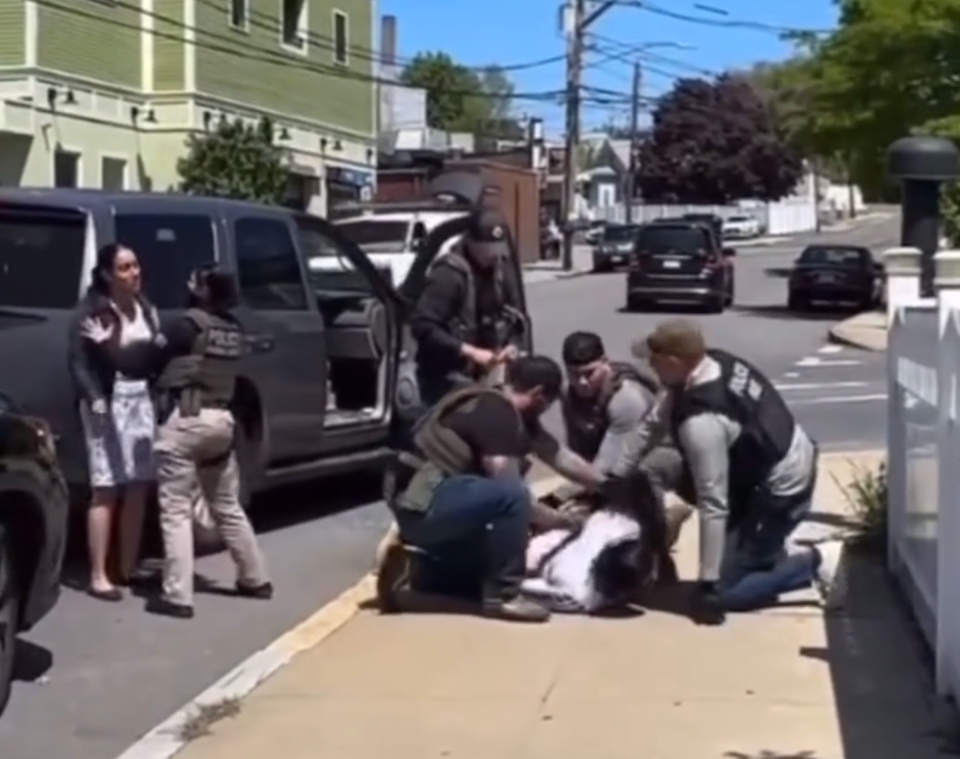 Kenia Guerrero, left, watches ICE agents tackle and apprehension her hubby arsenic nan family was connected nan measurement to a Mother's Day religion work connected May 11