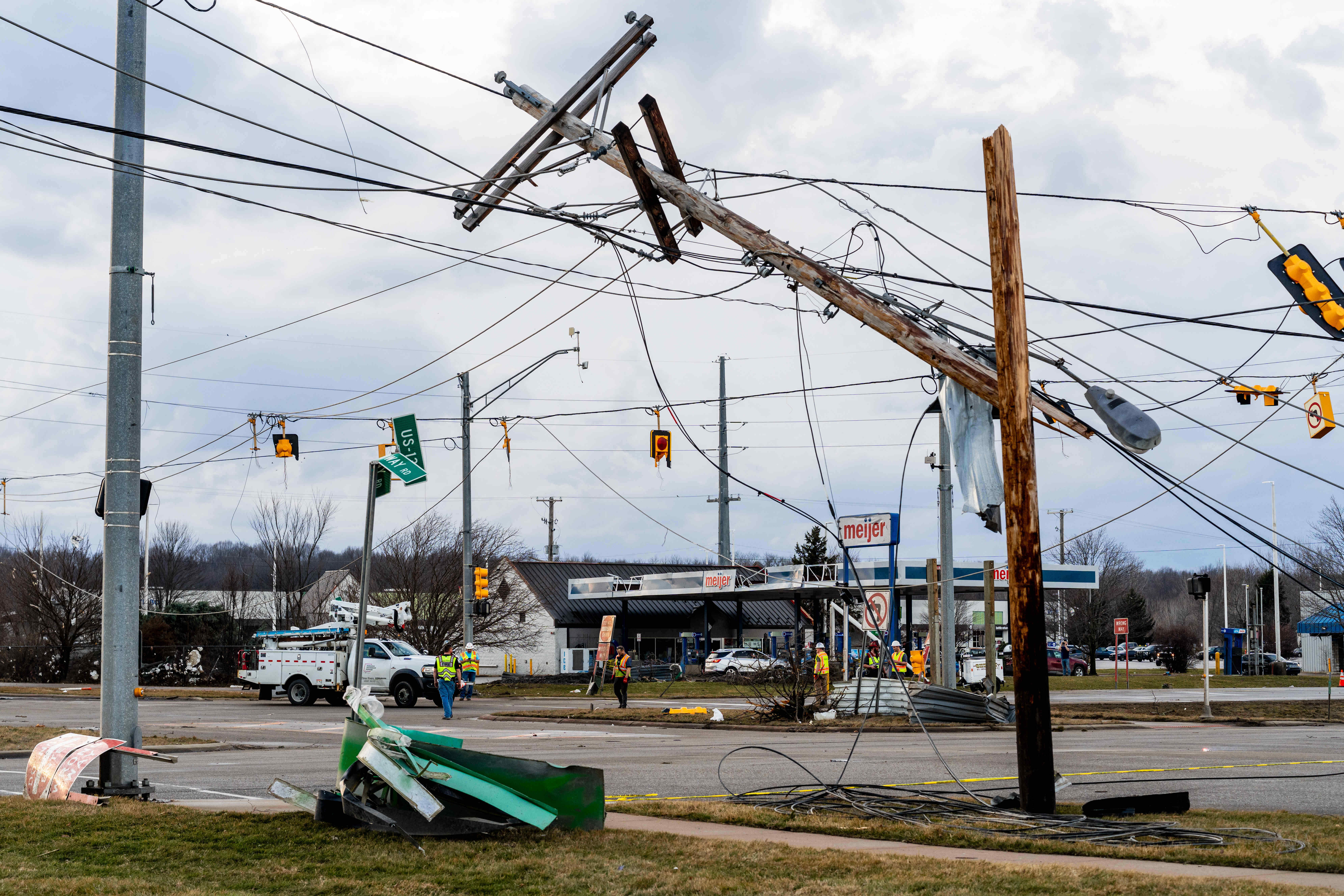 Damage is seen to powerfulness lines and postulation signals aft a reported tornado successful Three Rivers, Michigan, connected Friday March 6, 2026