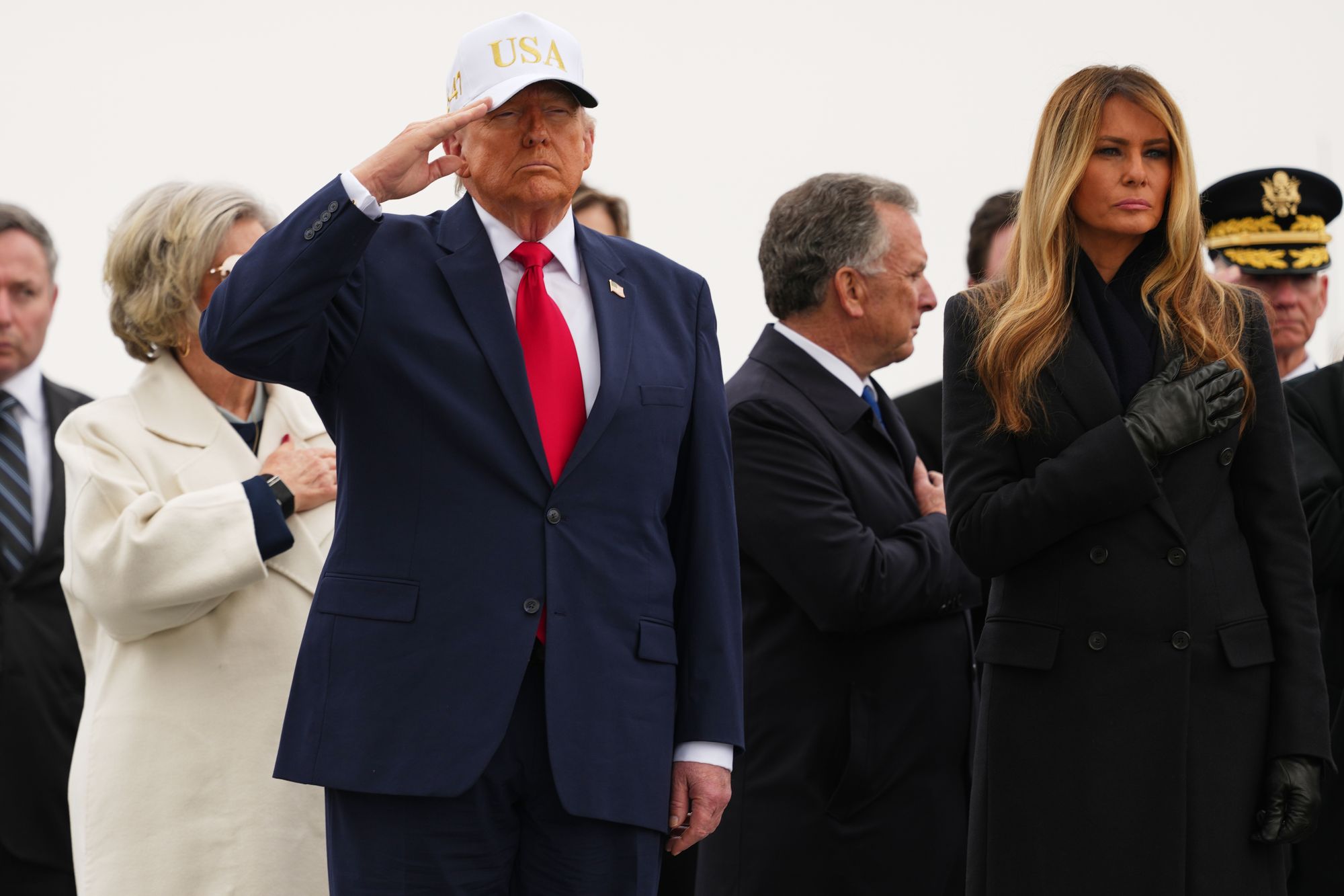 President Donald Trump and first woman Melania Trump be a casualty return for nan soldiers who were killed successful a drone onslaught astatine a bid halfway successful Kuwait