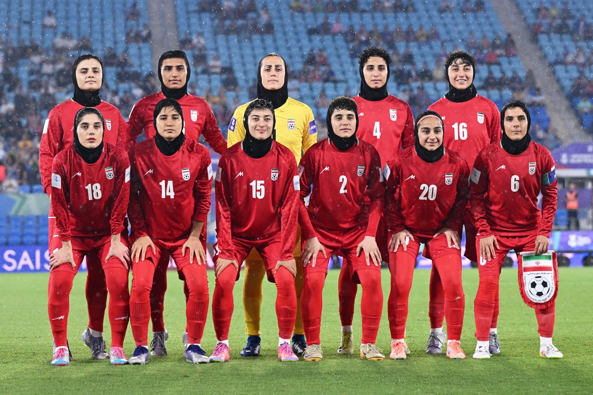 Trump warns Iran women’s football team could be killed after anthem protest and offers asylum in US