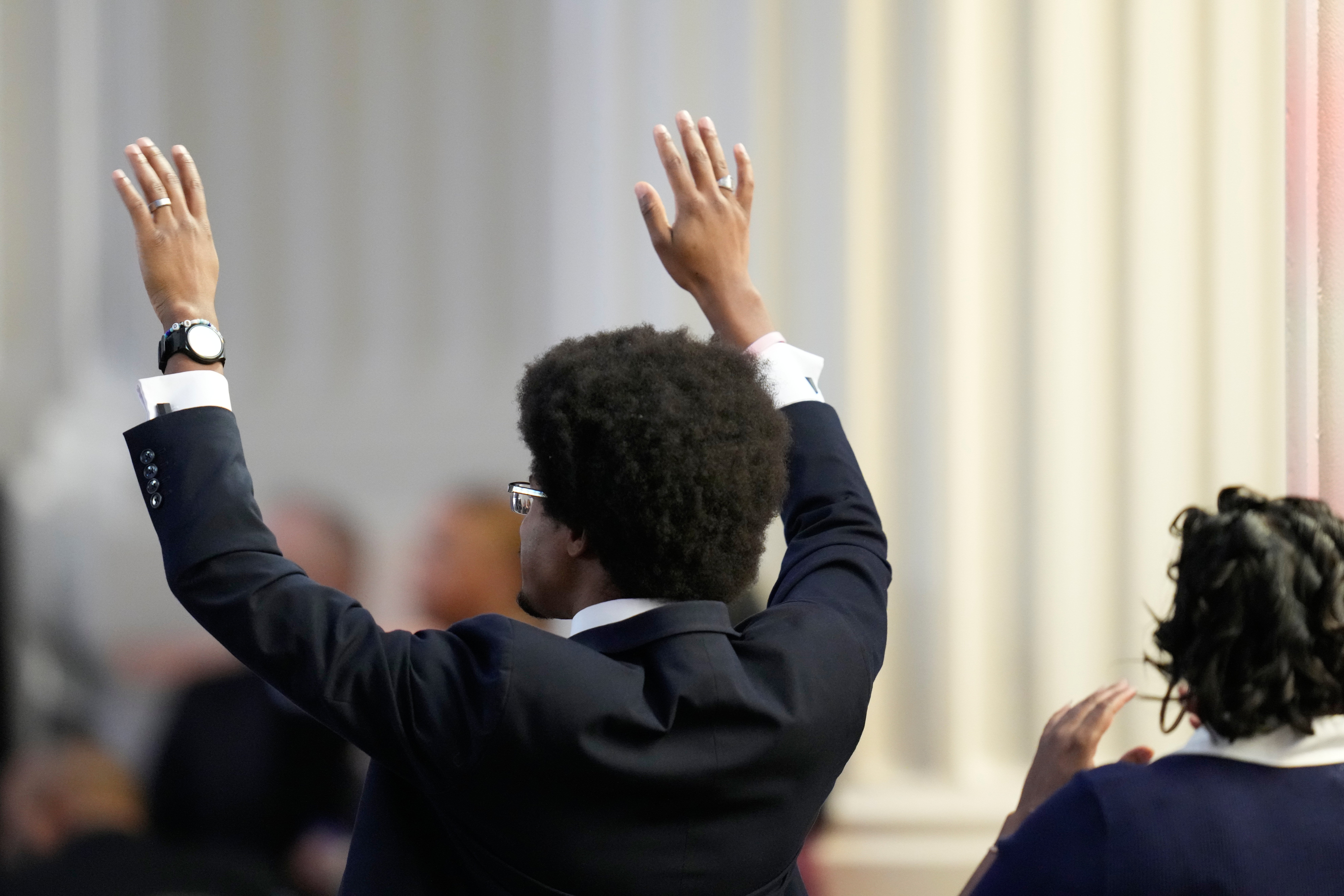 Tennessee authorities lawmaker Rep. Justin Pearson celebrates during nan Homegoing Celebration of Life for nan Rev. Jesse Jackson