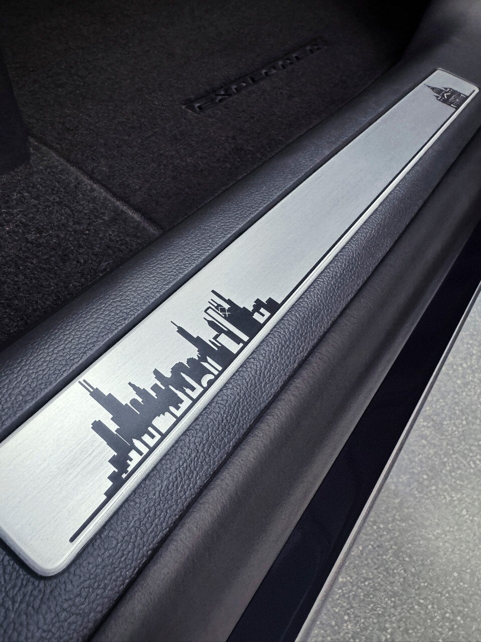 Inside nan car are engravings of nan Chicago skyline and St. Peter’s Basilica