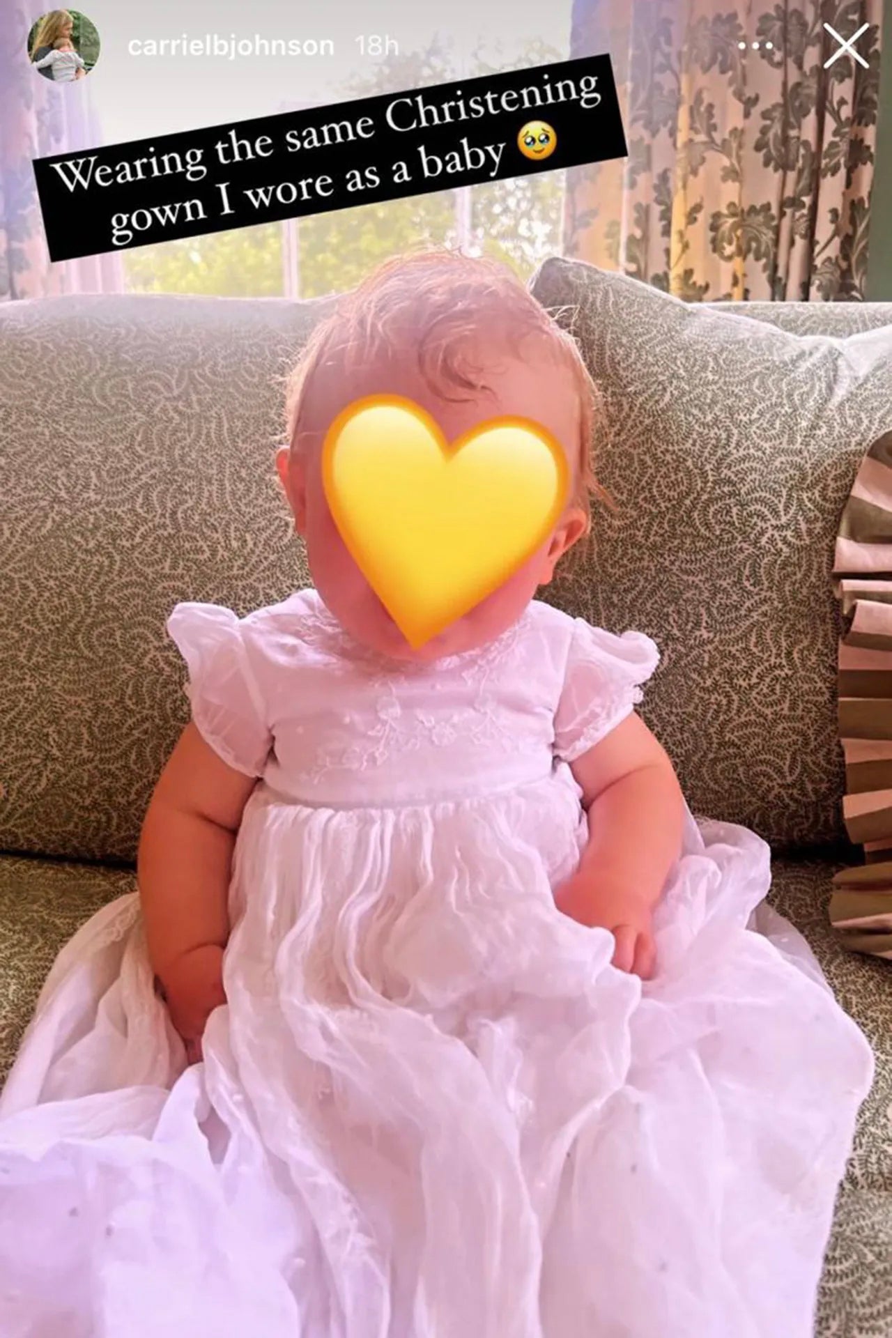 Carrie and Boris Johnson's son Frank with a yellow heart emoji covering his face for his baptism in 2024