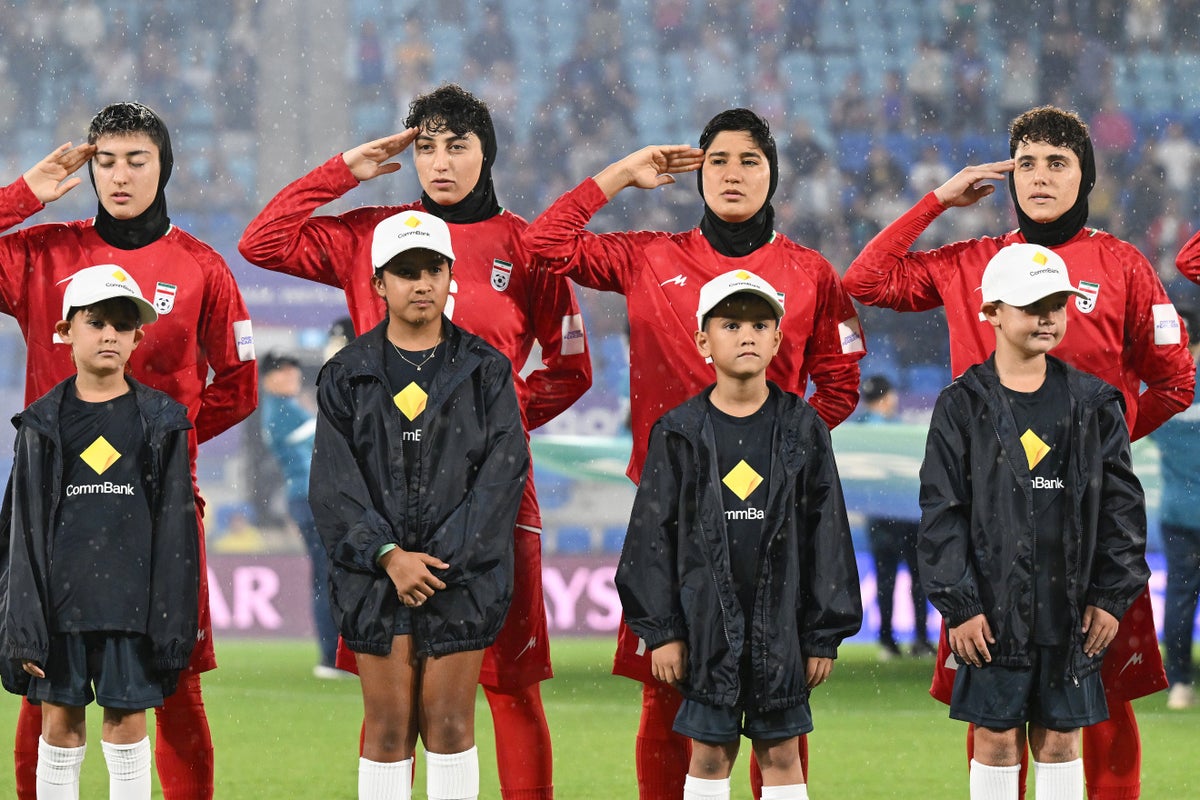 Iranian women footballers rejoin teammates to fly to Oman after Australia asylum U-turn