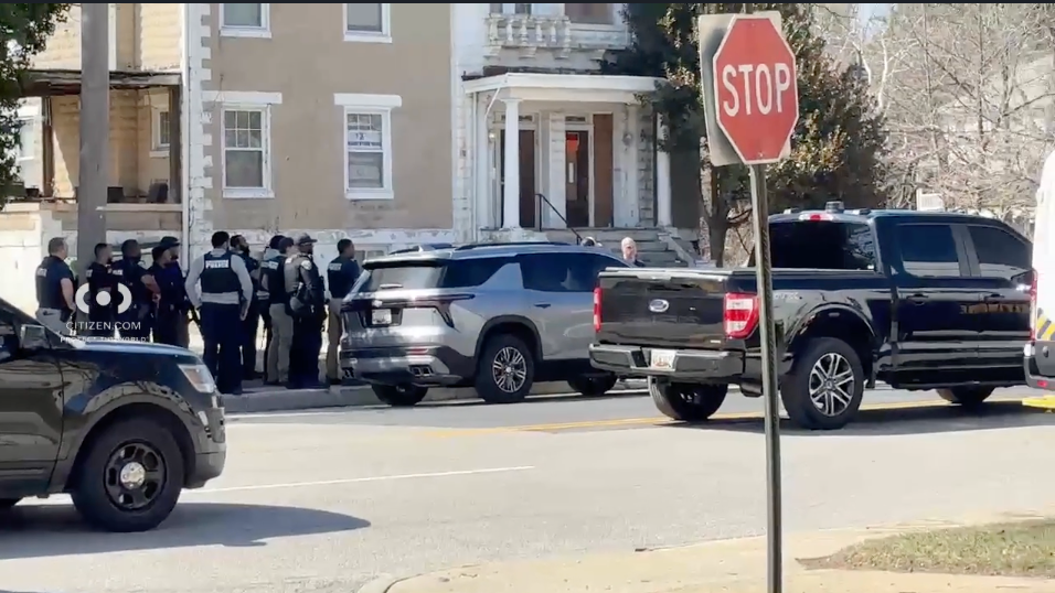 Around a twelve rule enforcement unit seen extracurricular of a location successful northwestern Baltimore