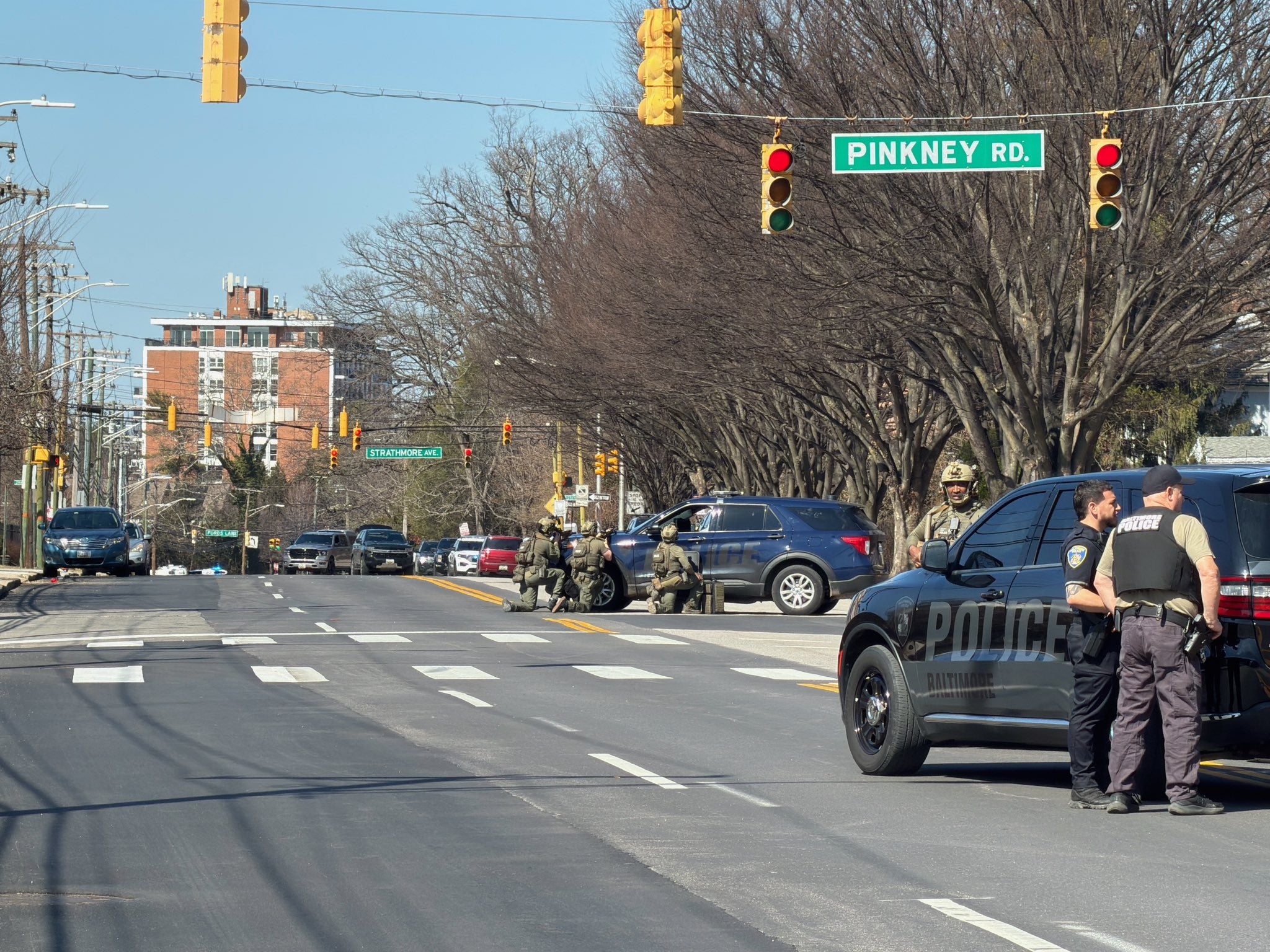 Baltimore shooting updates: Officer and suspect wounded in ‘active shooting’ incident near synagogue