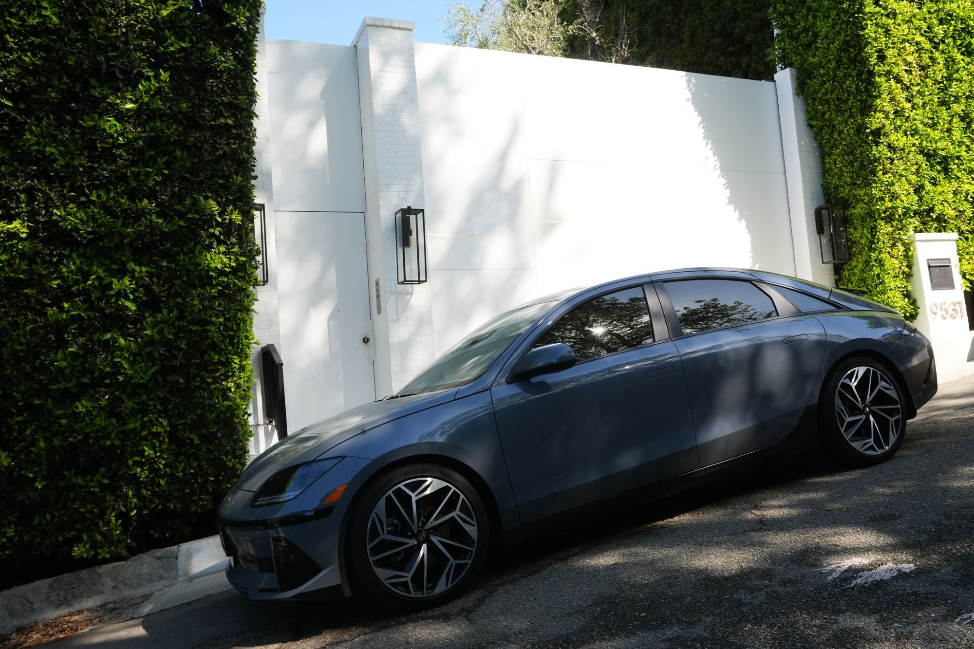 Bullet holes were reportedly found in the property’s gate, according to The LA Times