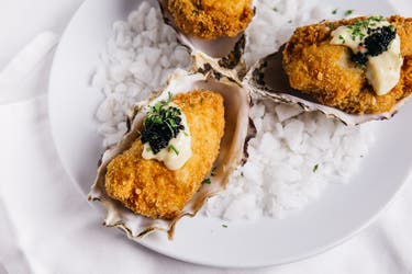 <p>Luxury ‘snacks’ are now one of the priciest parts of the restaurant menu</p>