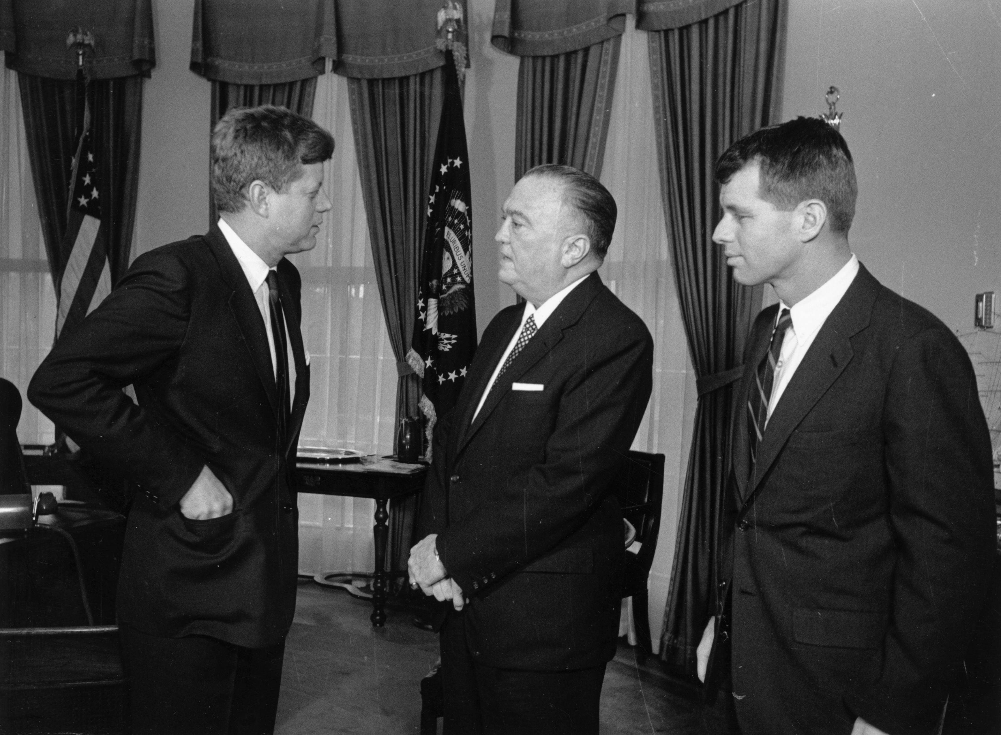 J. Edgar Hoover — pictured pinch President John Kennedy and Attorney General Robert F Kennedy successful 1961 — was possibly nan astir arguable head successful nan agency's 118-year history