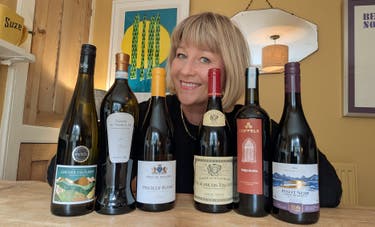 <p>Hall with the wines she recommends for drinking more gently during perimenopause</p>
