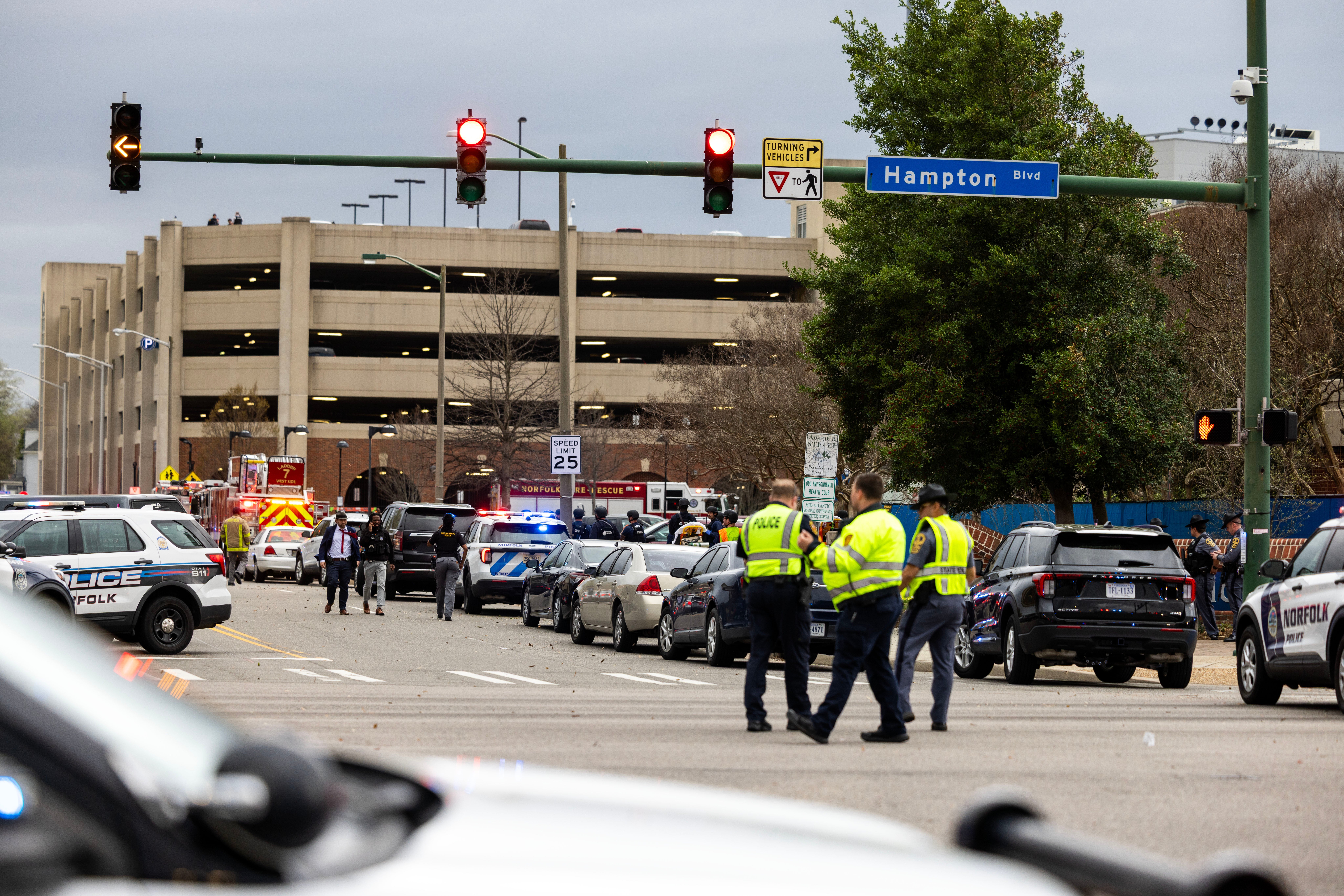 The gunman, who is also dead, opened fire just before 10:49 a.m. in Constant Hall, officials said