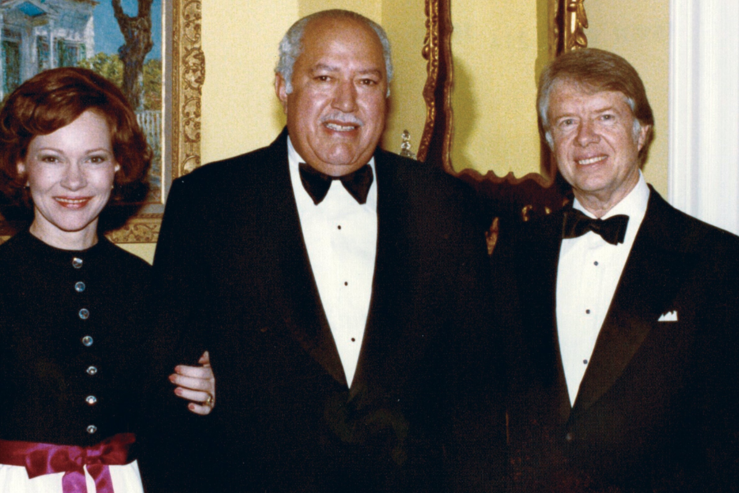 John Woodson Ficklin poses pinch President Jimmy Carter and First Lady Rosalynn Carter astatine nan White House