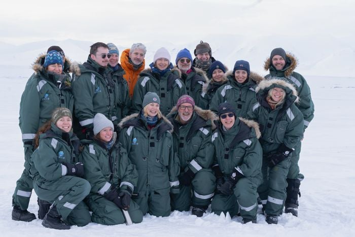 Norway's investigation curate Sigrun Gjerløw Aasland (front row, centre) poses pinch ambiance scientists successful Svalbard