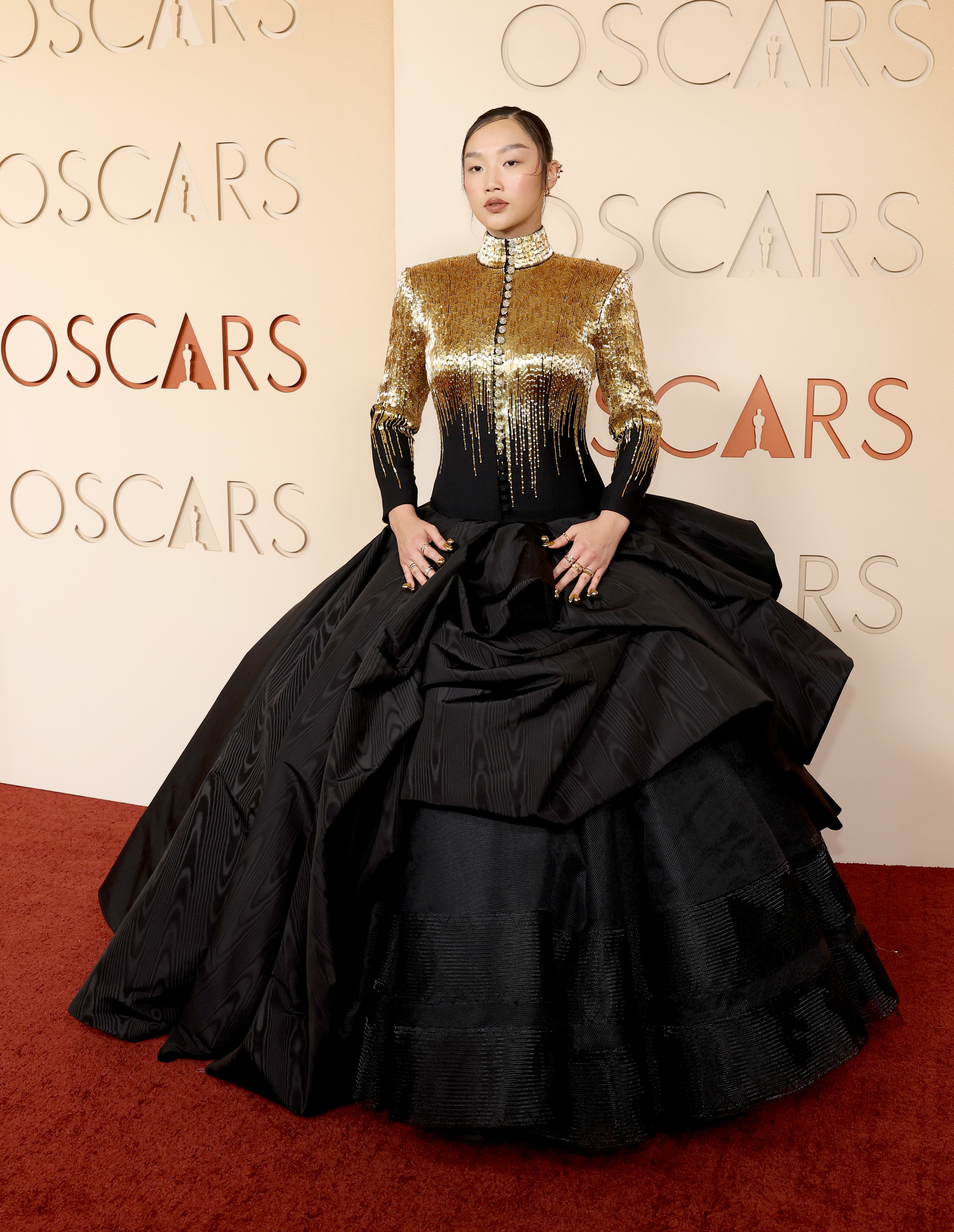 Audrey Nuna, known for her role in the Netflix hit ‘K-Pop Demon Hunters,’ looked gorgeous in a custom-made gold and black ensemble by Thom Browne