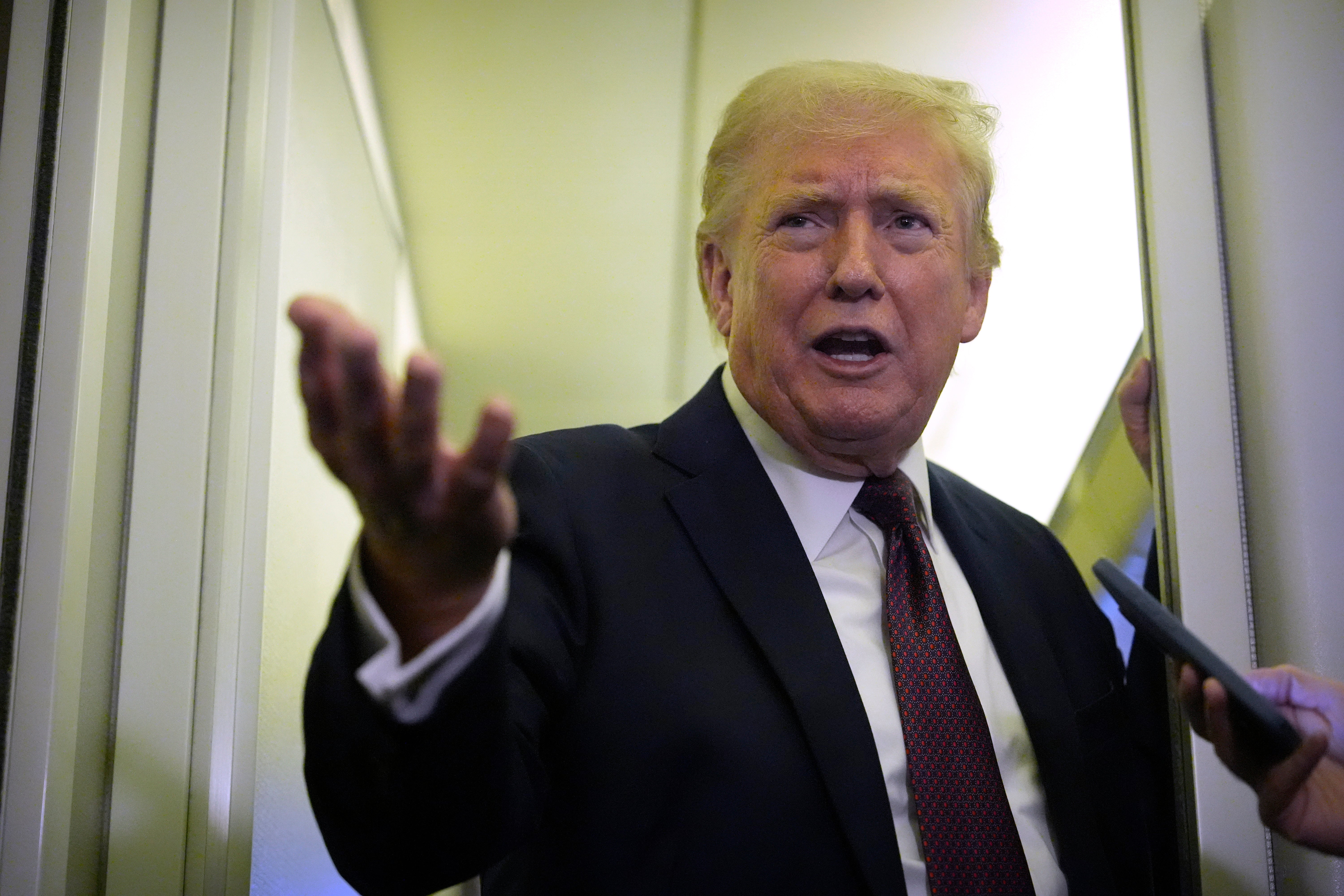 Trump lashed retired astatine reporters while aboard Air Force One connected Sunday
