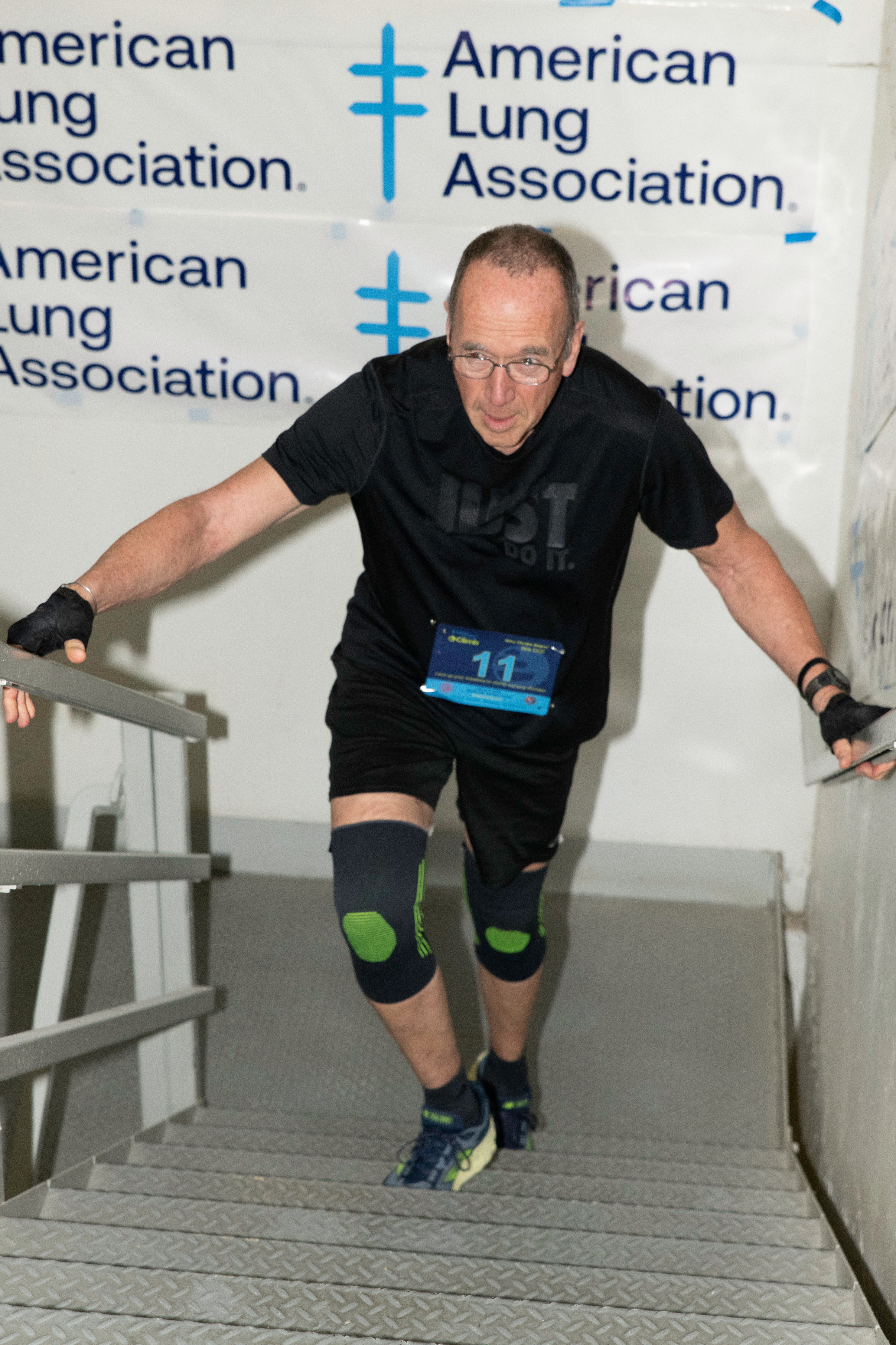 In this photo provided by the American Lung Association, Tom McGee participates in a fundraising run in the Oakbrook Terrace Tower building in Oakbrook, Ill., on Sunday, March 8, 2026. (Pat Davies/American Lung Association via AP)