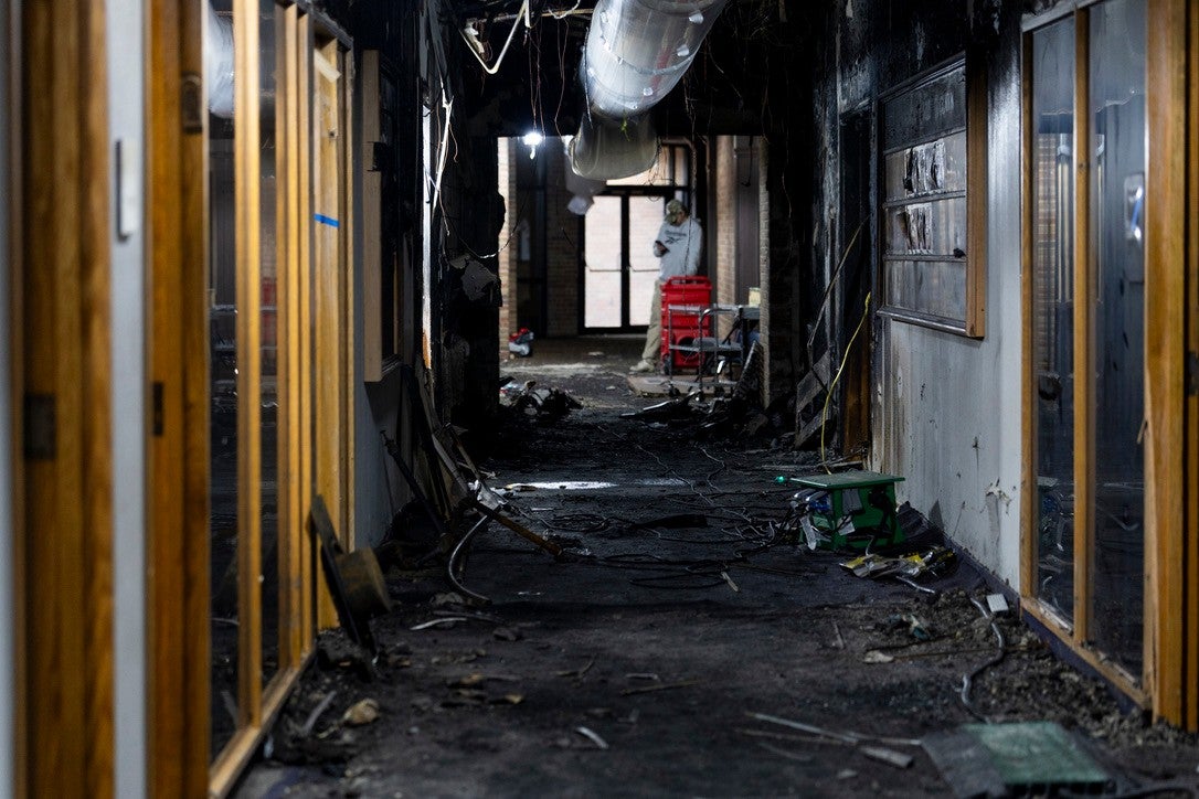 Images released by Temple Israel Thursday show scorched hallways and discolored photos aft a March 12 attack