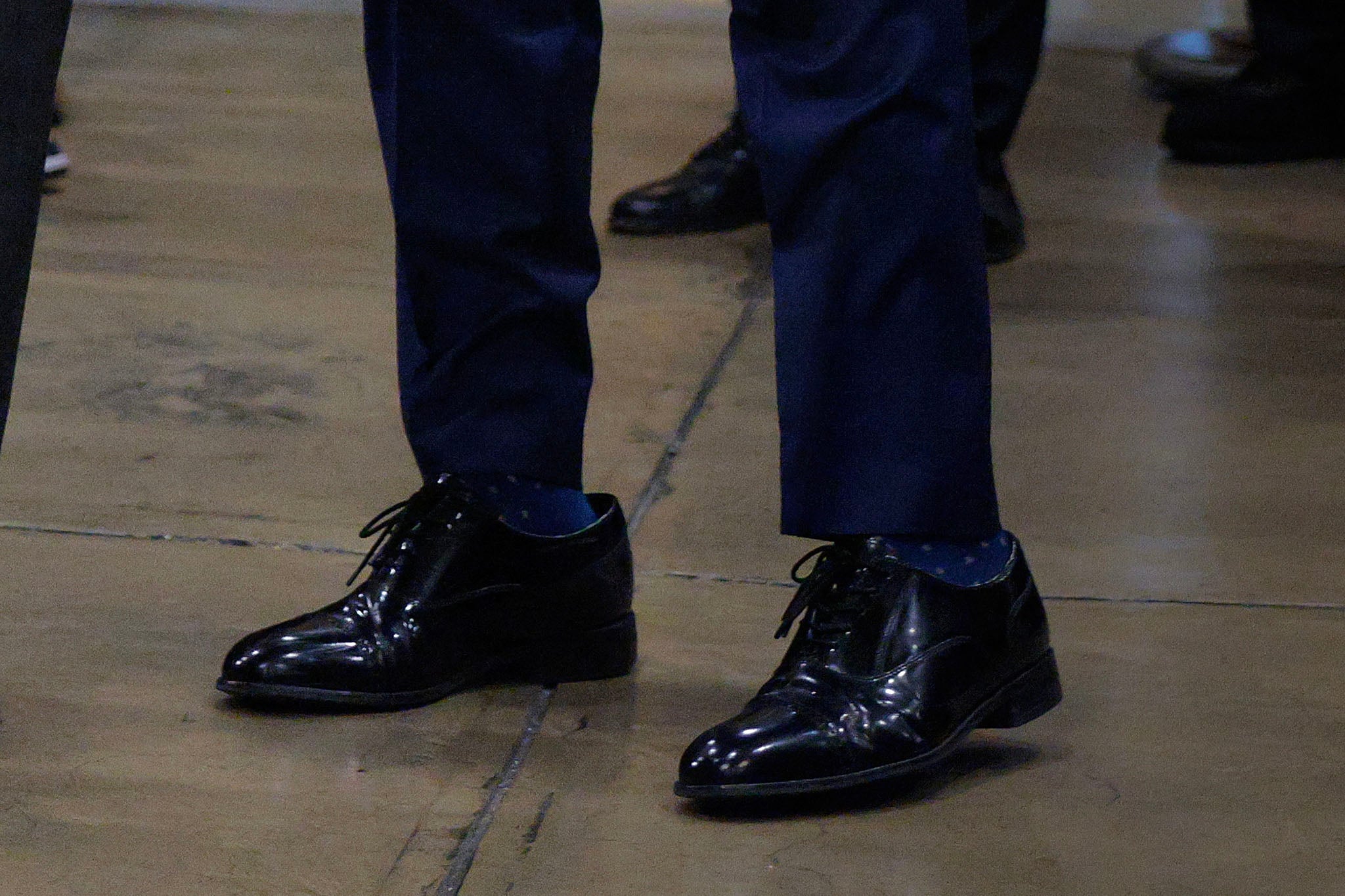 Trump’s beloved – and sometimes oversized – shoes that he gifts to his MAGA friends aren’t even made in America