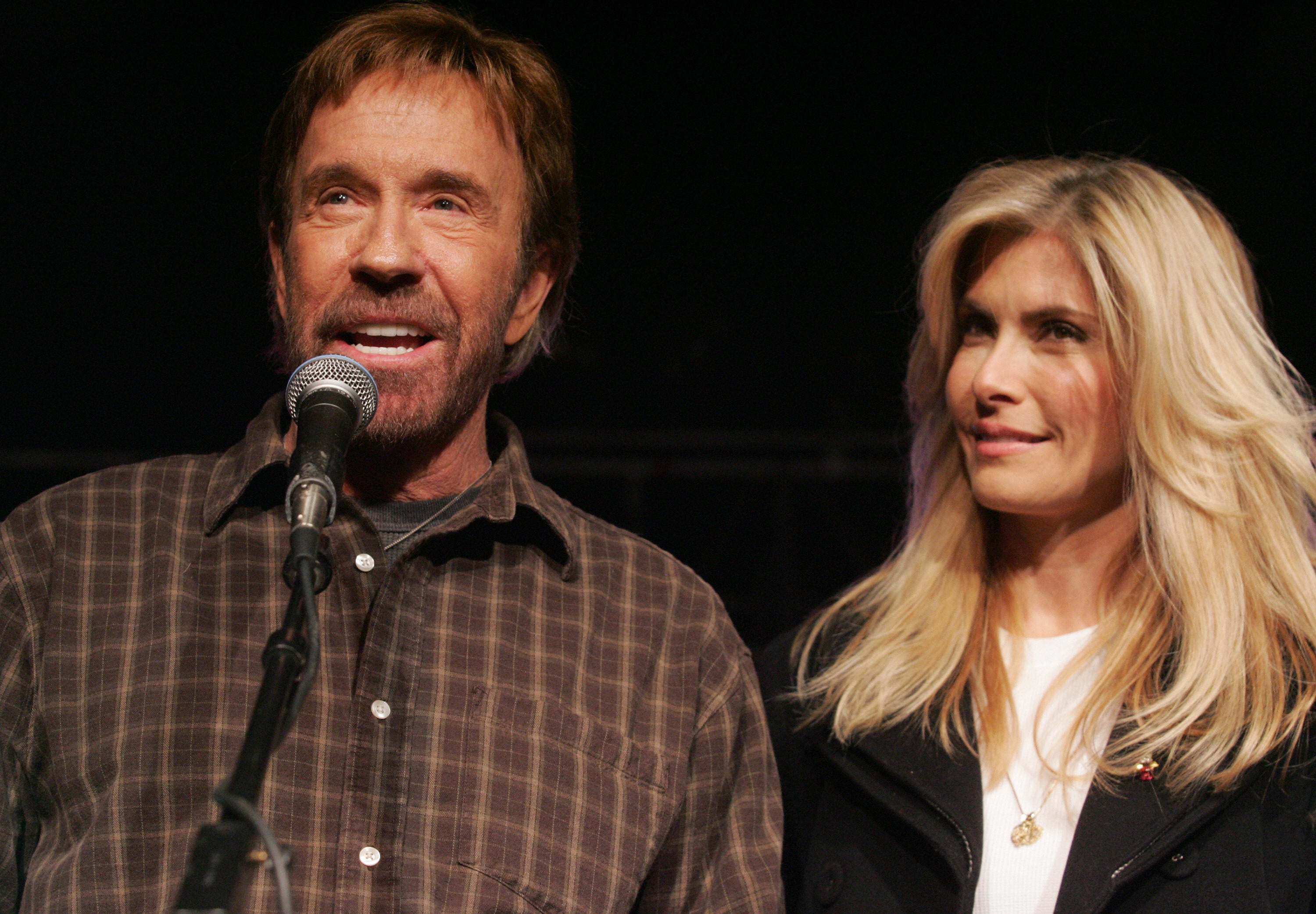 Chuck Norris and his wife, Gena O'Kelley, speaking at a rally in support of Mike Huckabee in 2008