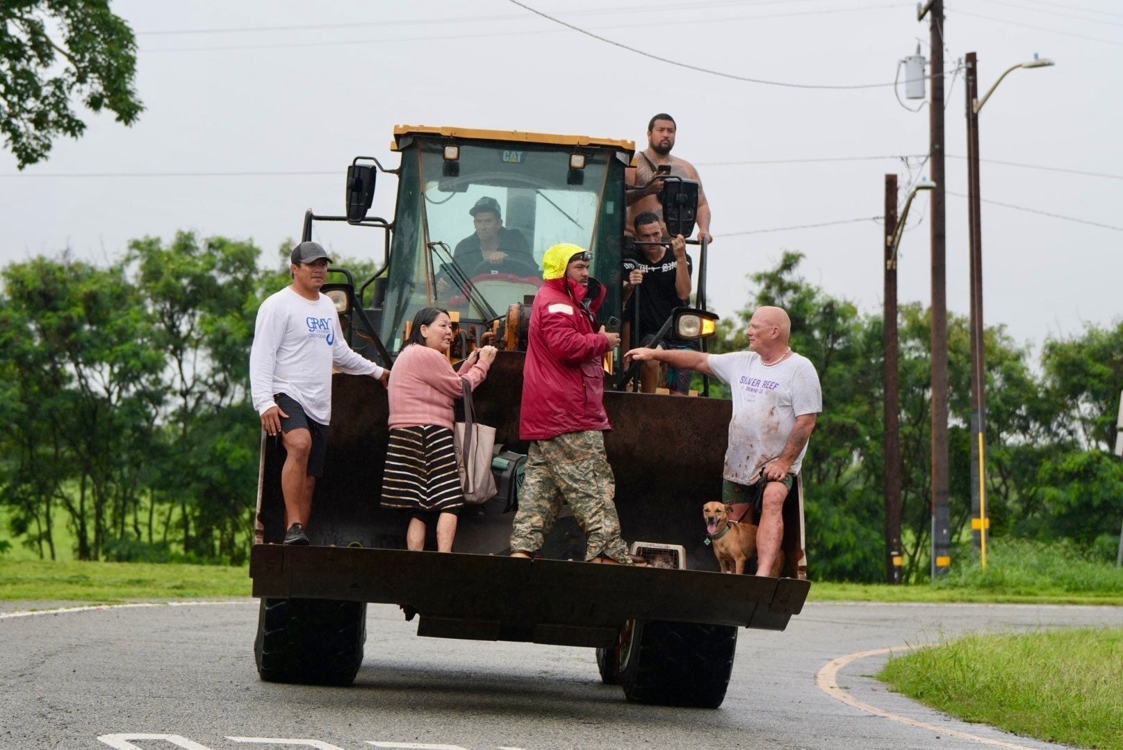 People are evacuated from Haleiwa, Hawaii, connected a bulldozer