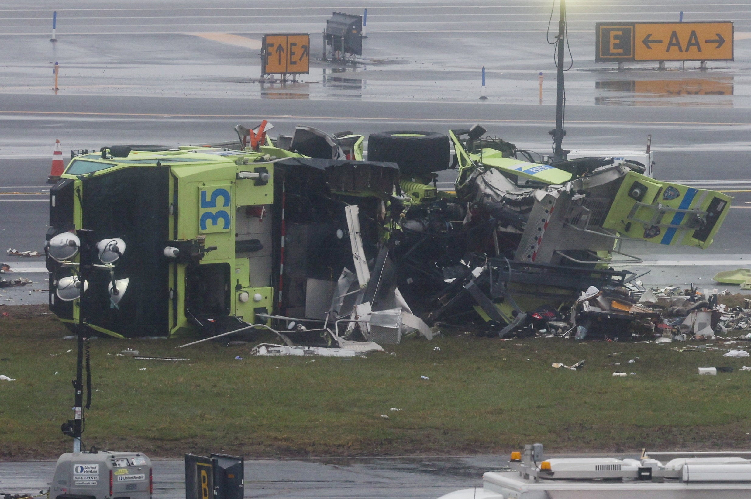A damaged occurrence motortruck astatine nan segment aft an Air Canada Express pitchy collided pinch a crushed conveyance astatine New York's LaGuardia Airport successful Queens, New York, U.S., March 23, 2026