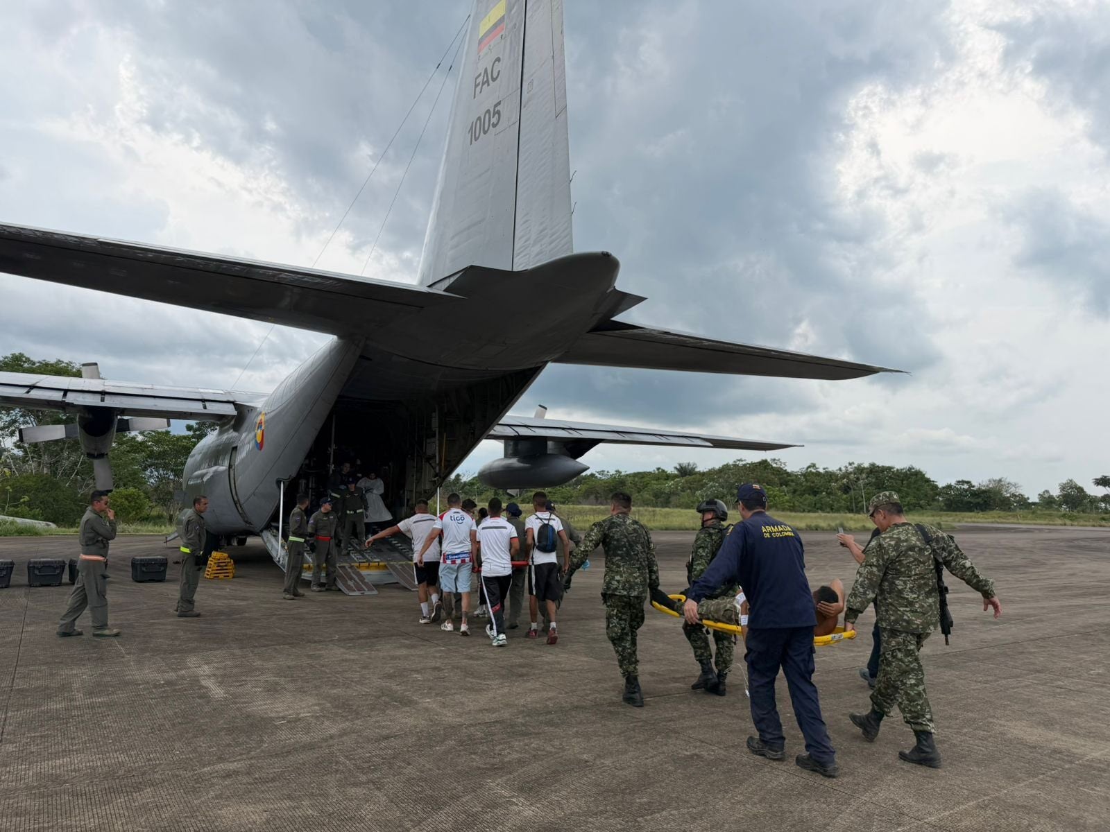 In this photograph distributed by Colombia's Armed Forces property office, group who were injured connected a subject cargo level that collapsed soon aft return disconnected are loaded connected to different subject level to evacuate them for treatment, from Puerto Leguizamo, Colombia, Monday, 23 March 2026