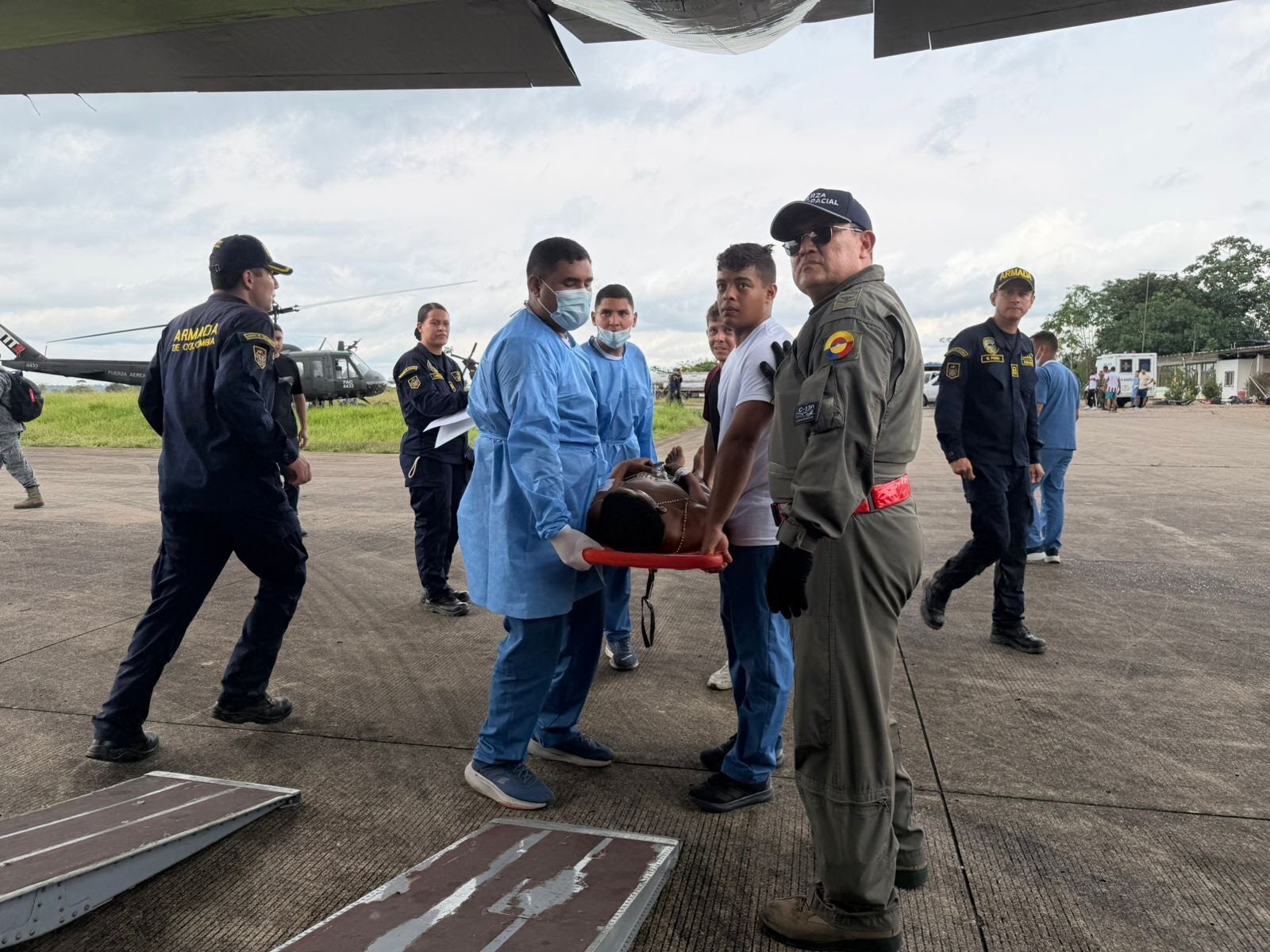 In this photograph distributed by Colombia's Armed Forces property office, group who were injured connected a subject cargo level that collapsed soon aft return disconnected are loaded connected to different subject level to evacuate them for treatment, from Puerto Leguizamo, Colombia, Monday, 23 March 2026