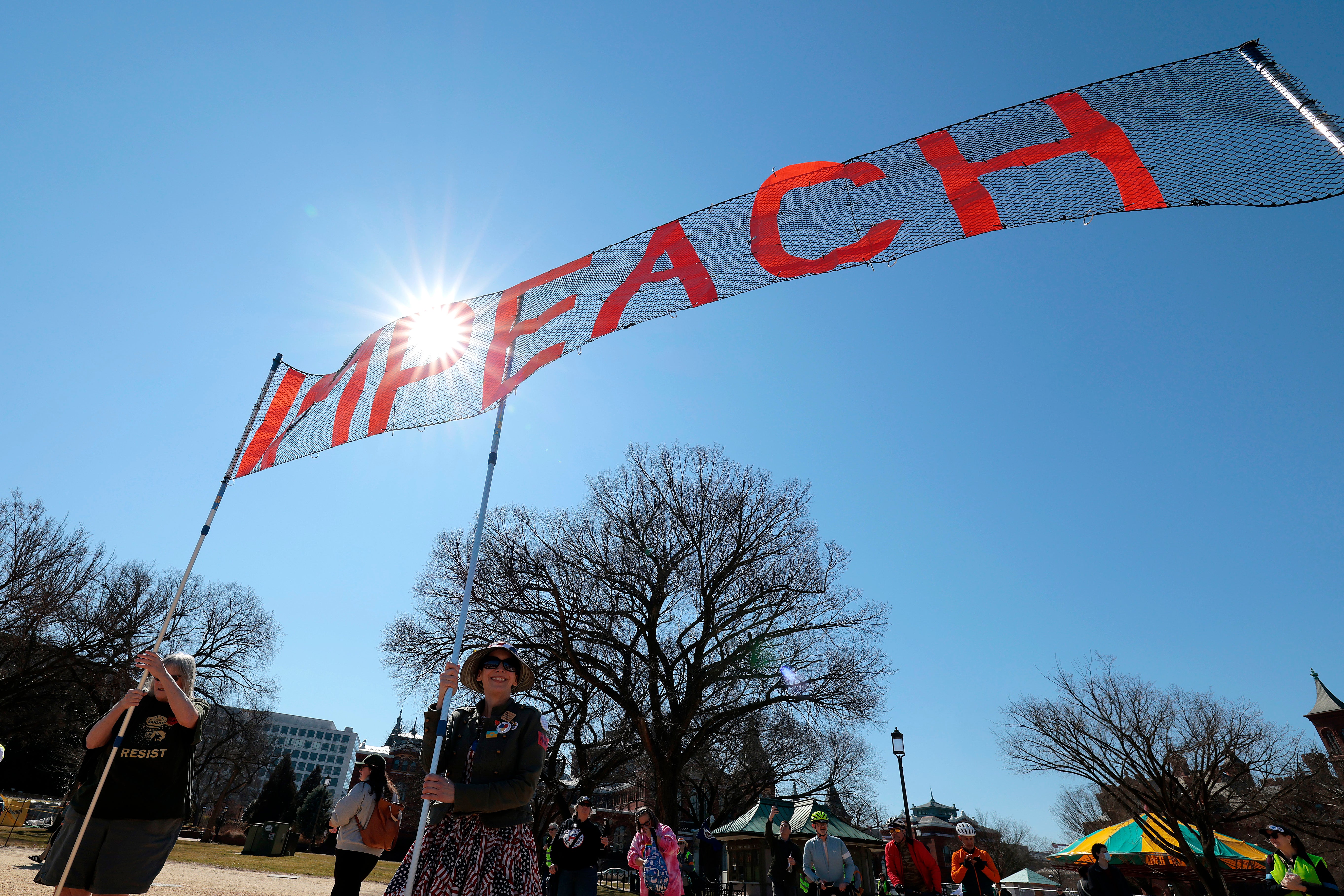 Protesters called for Trump's impeachment arsenic nan president was initiating strikes connected Iran without nan support of Congress