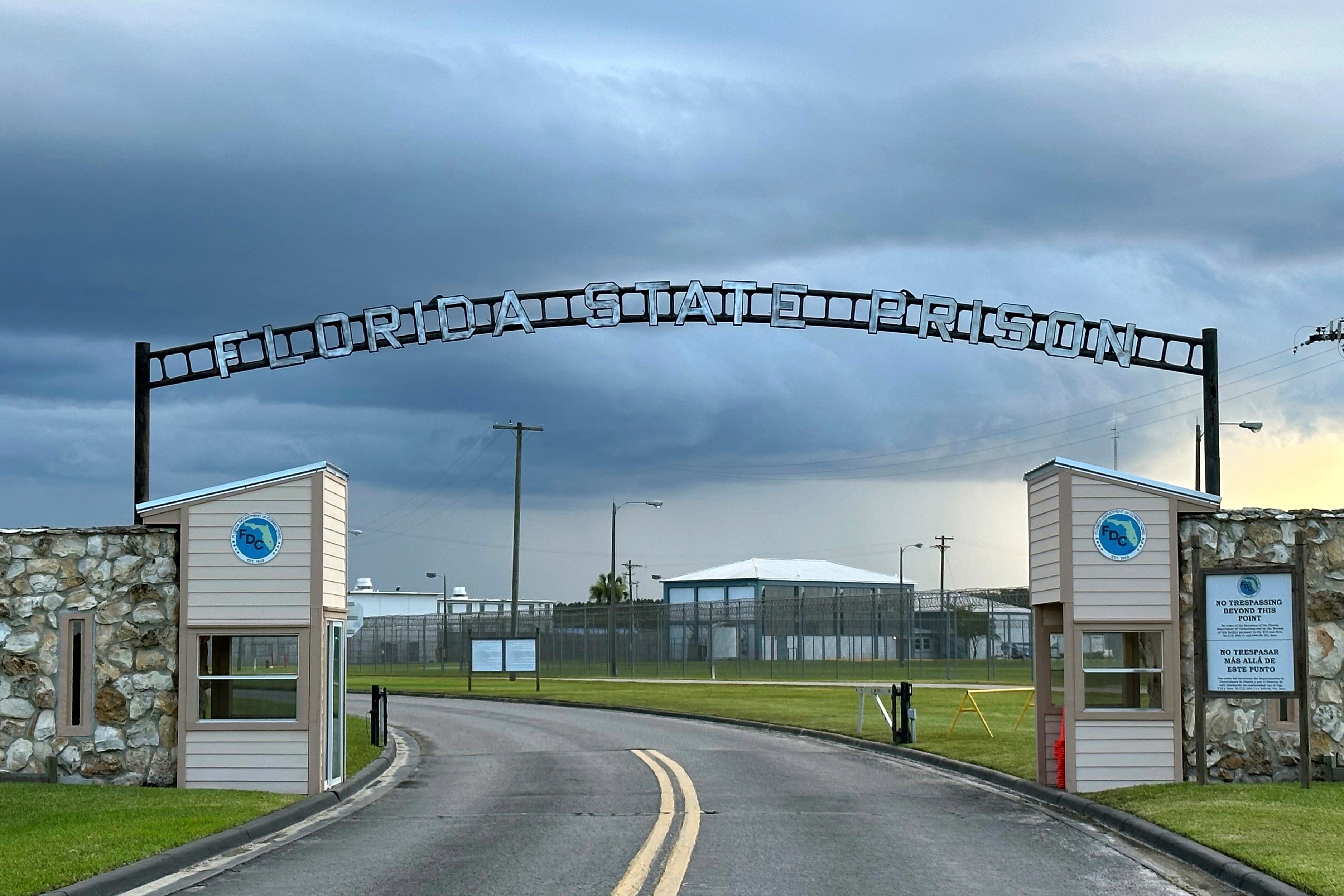 Clouds hover over the entrance of the Florida State Prison in Starke, Fla., Aug. 3, 2023. (AP Photo/Curt Anderson, File)