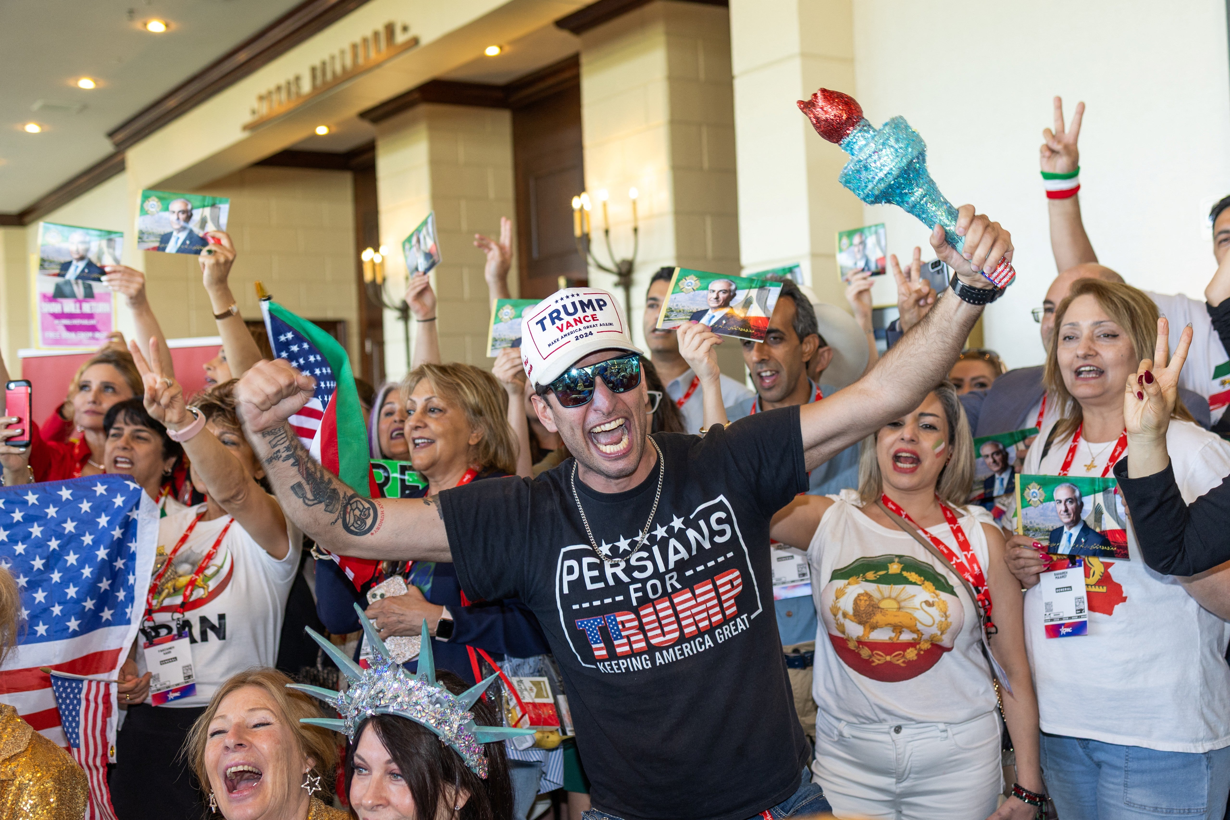 Pro-war 'Persians for Trump' activists successful attendance astatine CPAC successful Texas expressing their support for a conflict that removed Iran's ultimate leader aft 47 years successful power