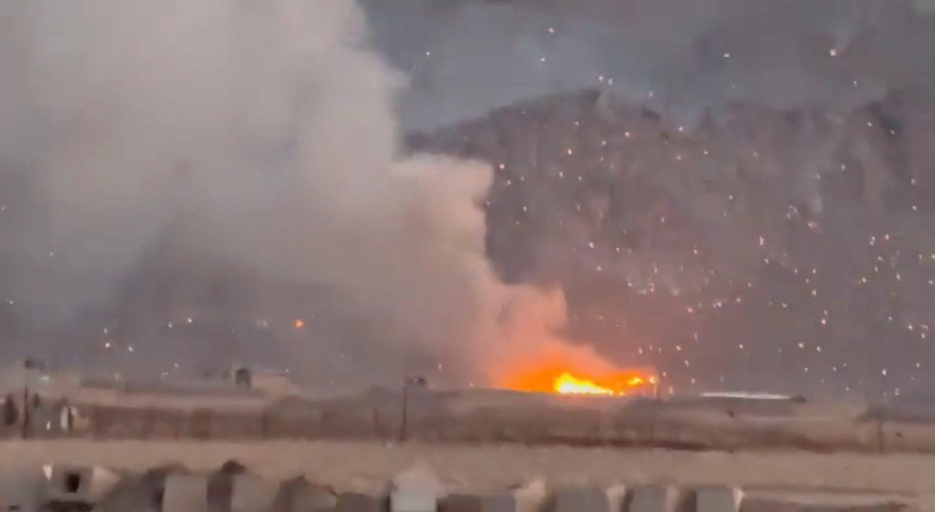 Smoke rises pursuing a reported strike, arsenic burning debris litter nan surrounding area, amid nan US-Israeli conflict pinch Iran, successful Baharestan, Isfahan province, Iran, successful this screengrab taken from a societal media video released connected 1 April 2026