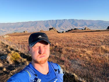 <p>Harry on the trail – which he says beats running past Tescos and Greggs back home</p>