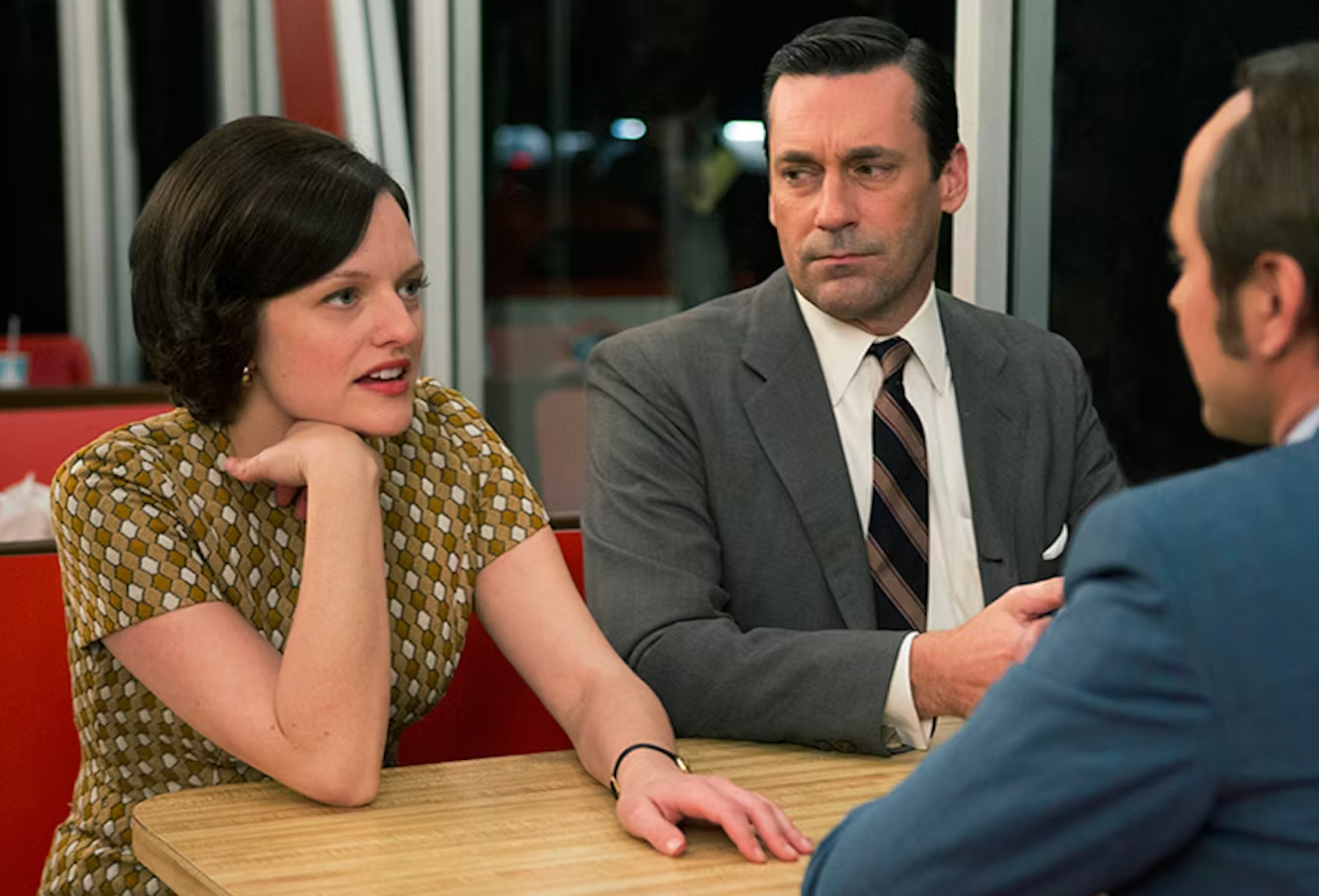 Dysfunctional: Peggy Olson, played by Elisabeth Moss, and Jon Hamm’s Don Draper in ‘Mad Men’