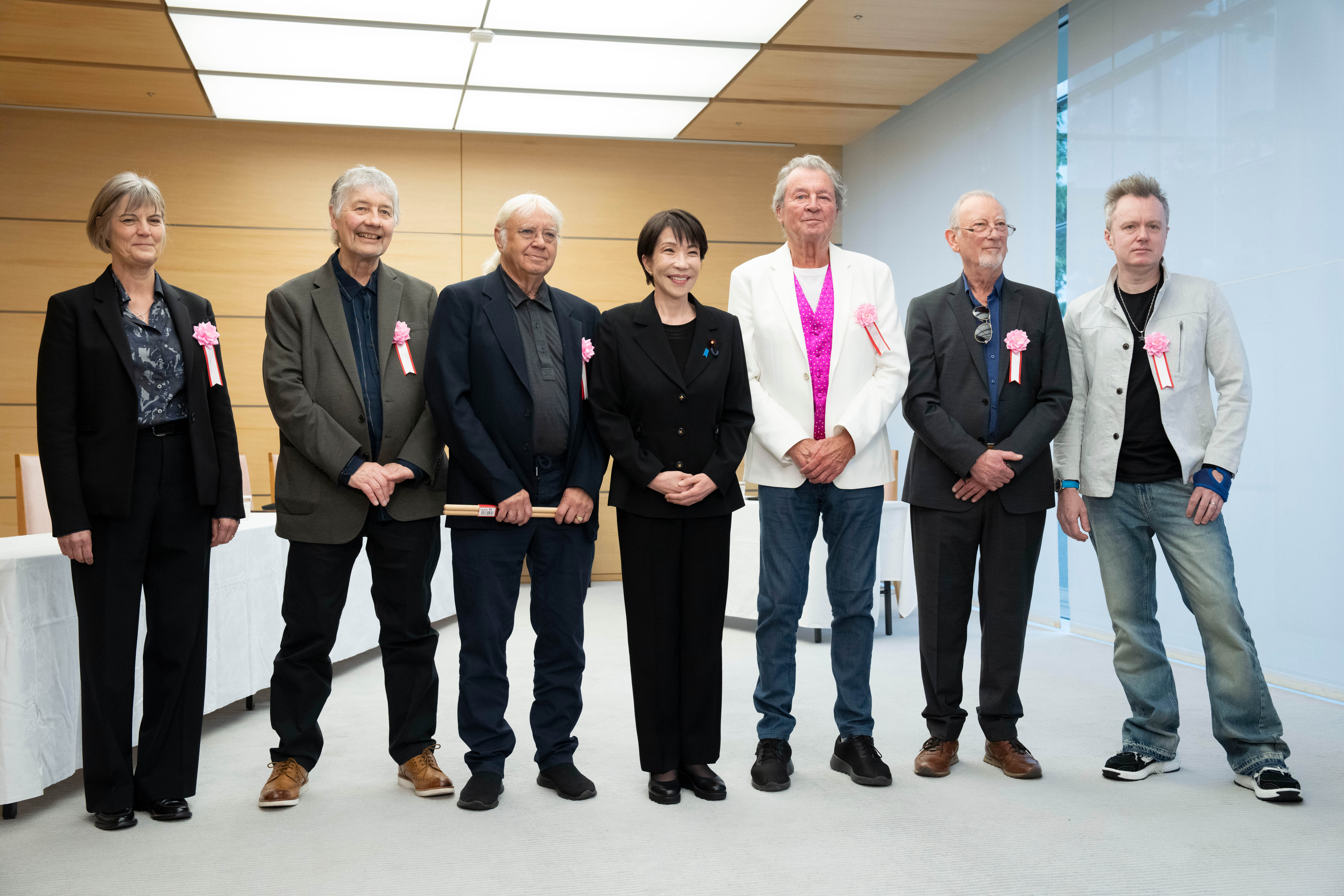 ‘You are my god’: Deep Purple thrill Japan’s superfan prime minister with flying visit